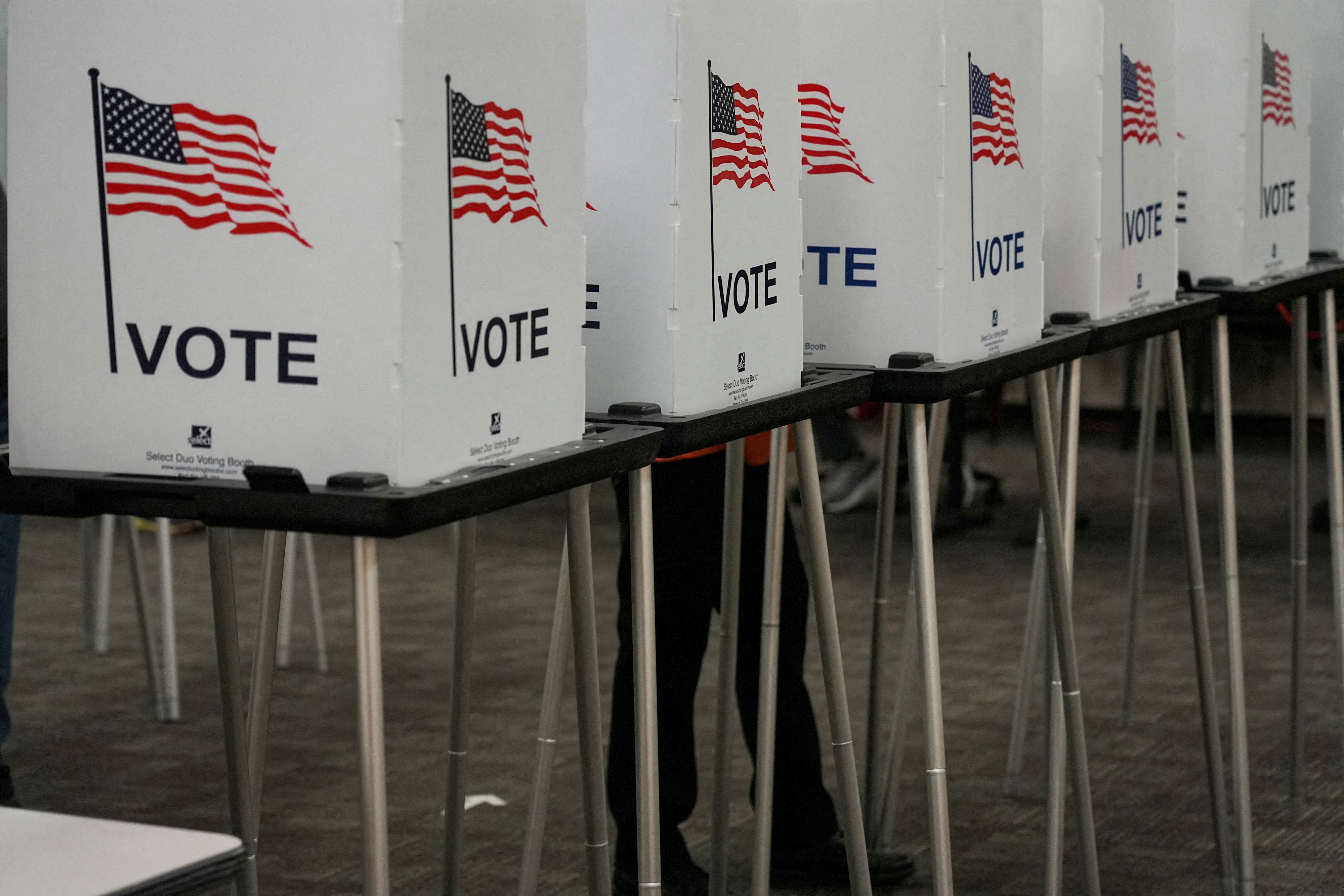 Voting booths are pictured inside the Dona Ana County Government Center during early voting for the upcoming midterm elections in Las Cruces, New Mexico, Oct. 24, 2022.