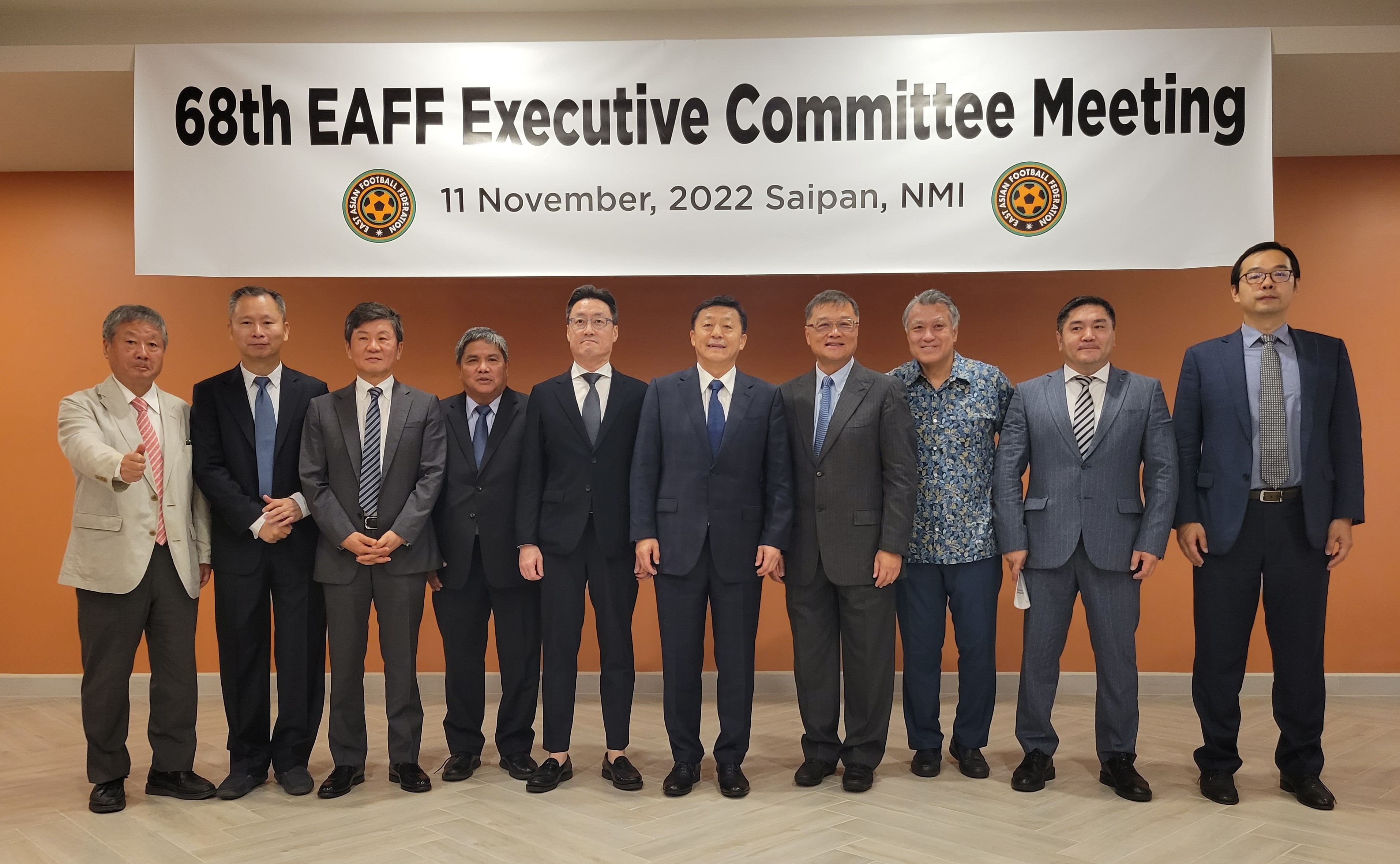 East Asian Football Federation :resident Du Zhaocai, sixth left, joins, from left, EAFF CFO Hiroyuki Hamaguchi, Chinese-Taipei Football Association’s Chris Wang, Korean Football Association President Chung Mong-gyu, Guam Football Association President Valentino San Gil, EAFF Vice President Hanjin Chun, NMIFA President Jerry Tan,  EAFF Vice President Kozho Tashima, Mongolian Football Federation President Ganbaatar Amgalanbaatar, and EAFF General Secretary Roger Luo Zhao pose for a group photo at  the conclusion of the 68th EAFF Executive Committee Meeting held Friday at the Crowne Plaza Resort Saipan.