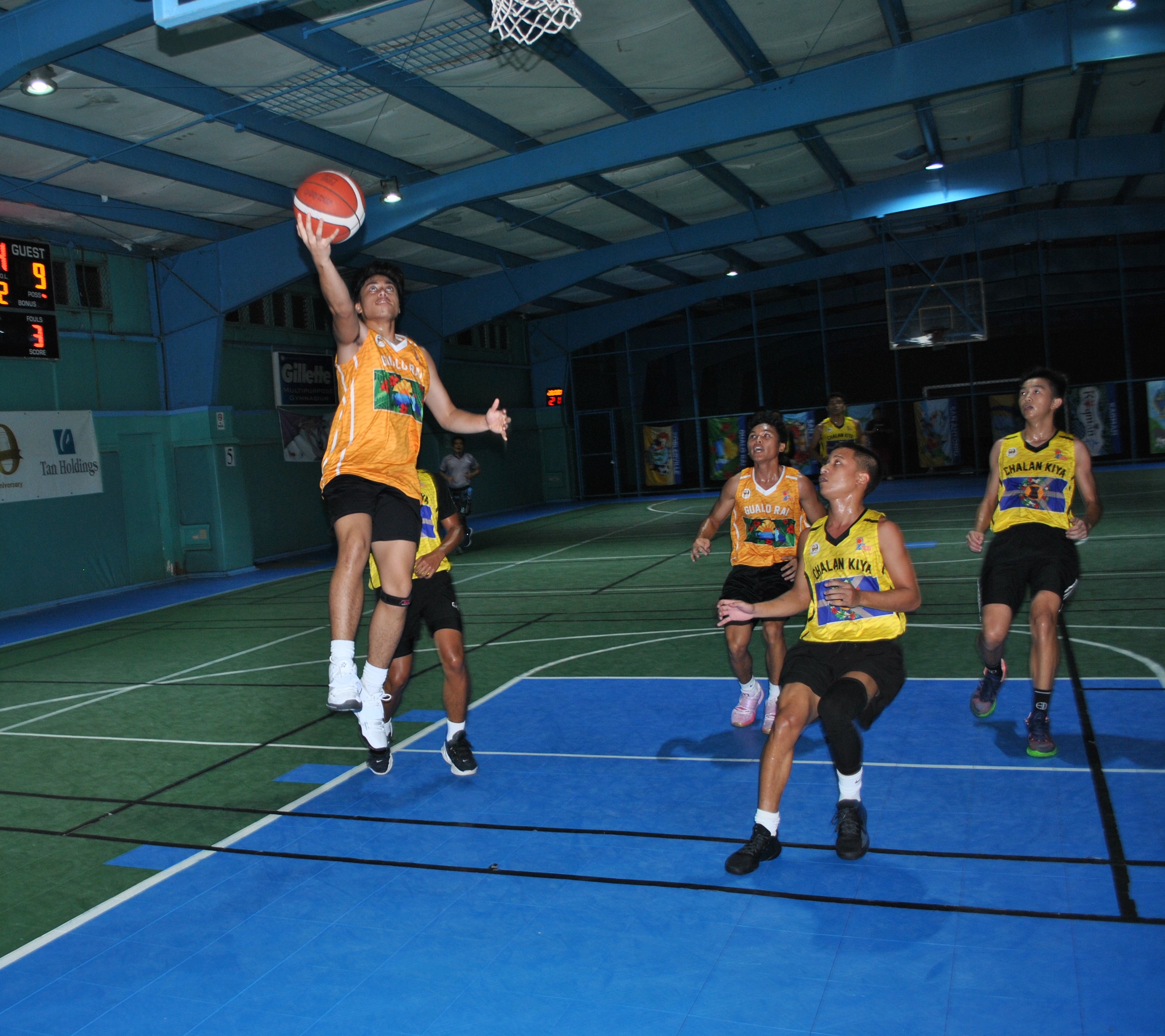 Gualo Rai's Elijah Garcia extends for the finish during a U18 boys division game of the 2022 Marianas Village Pride Basketball League at the TSL Sports Complex on Saturday.