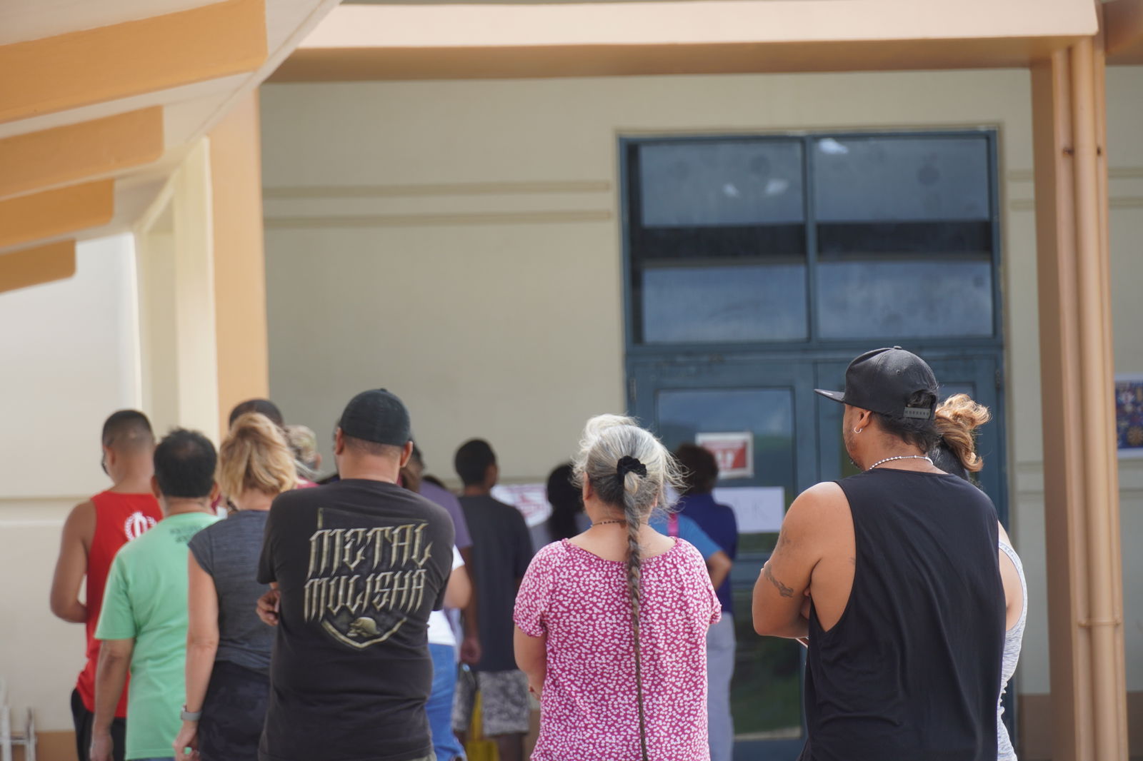 Kagman voters line up to cast their ballots on Tuesday afternoon at Chacha Oceanview Middle School.