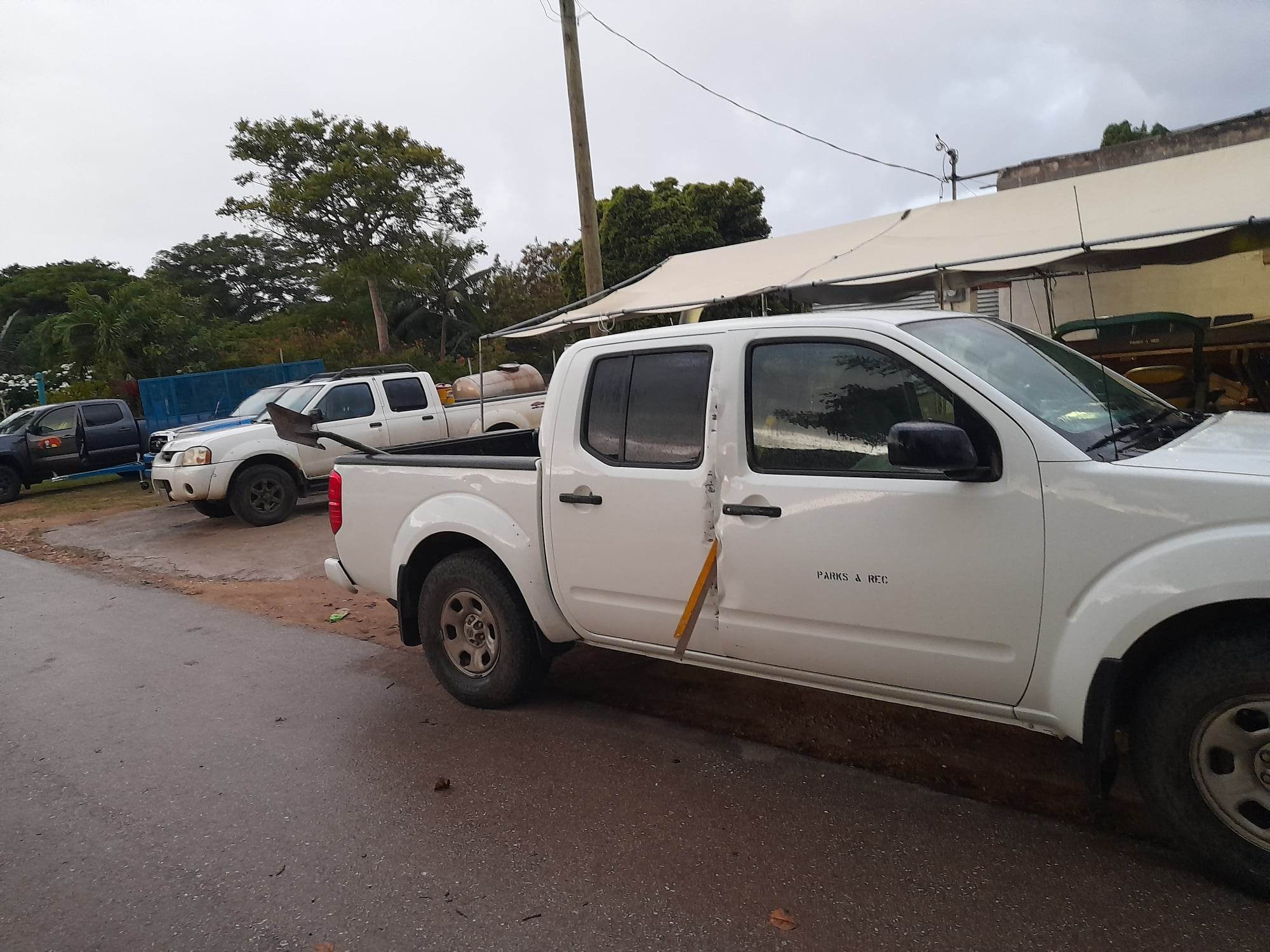 The door of a Parks and Recreation utility truck was damaged by someone who tried to forcibly open it.