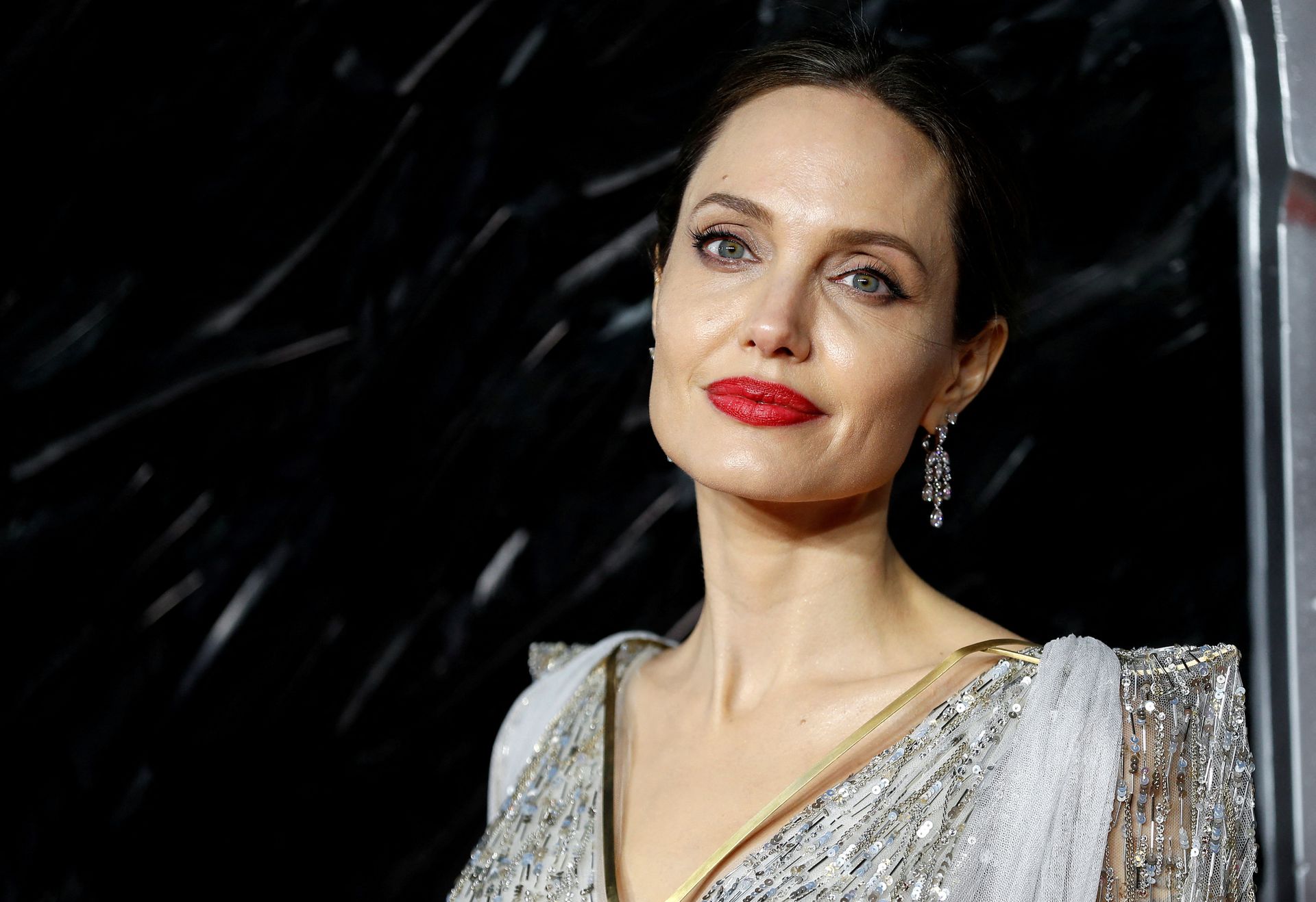 Angelina Jolie poses as she attends the UK premiere of "Maleficent: Mistress of Evil" in London, Britain on Oct. 9, 2019.