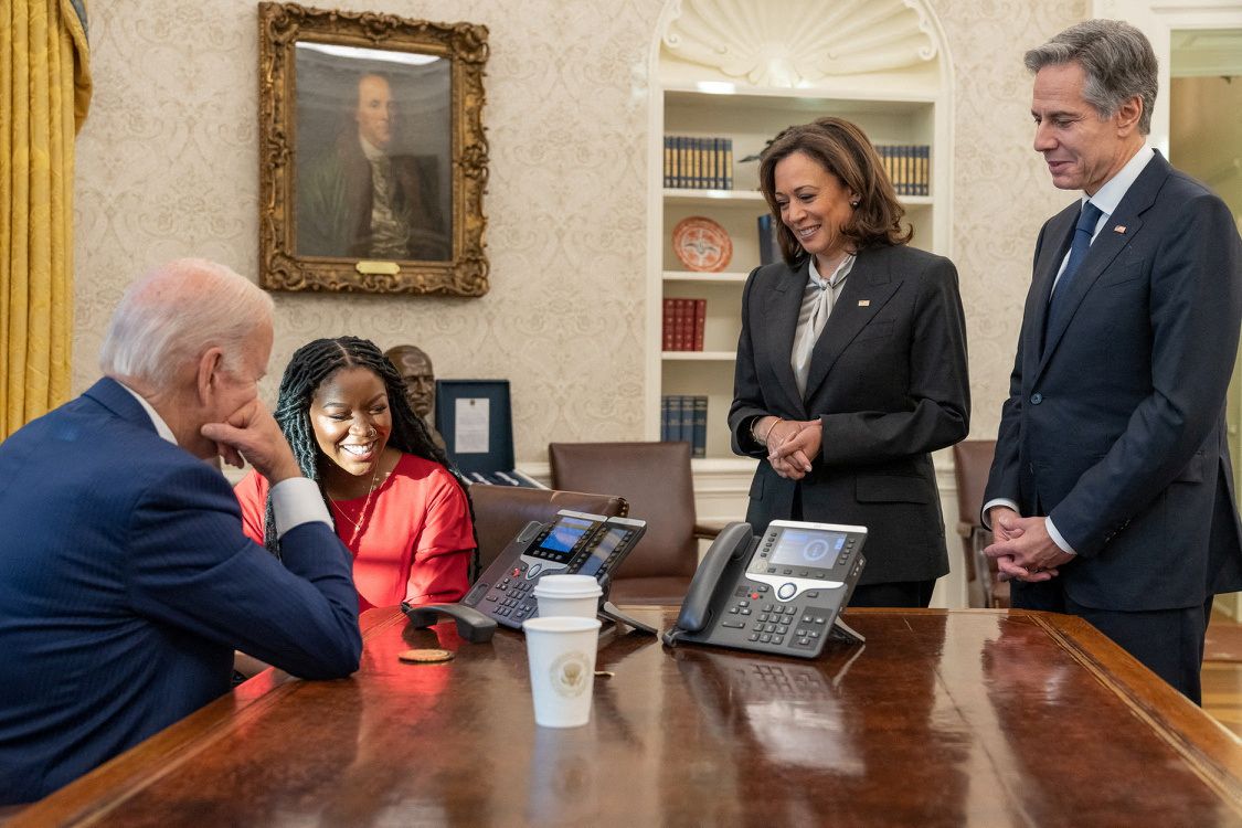 President Joe Biden and Cherelle Griner speak on the phone with WNBA basketball star Brittney Griner after her release by Russia, in this White House handout photo taken in the Oval Office, as Vice President Kamala Harris and Secretary of State Antony Blinken look on, at the White House in Washington, D.C., Dec. 8, 2022.