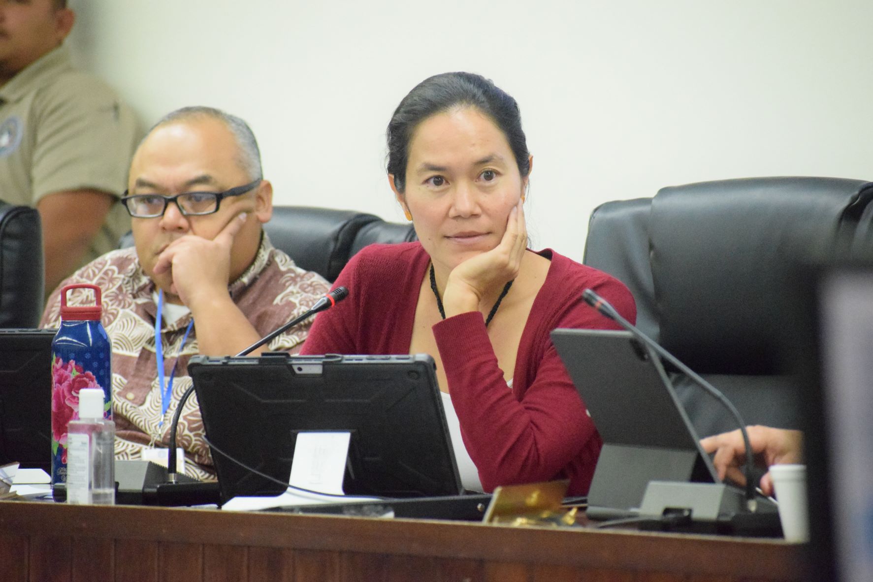 Rep.  Tina Sablan listens during Thursday’s public hearing on the BOOST program. Also in photo: Vice Speaker Blas Jonathan Attao.