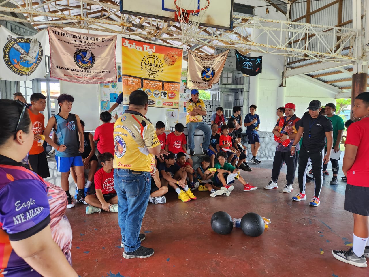 The Saipan Magalahi Eagles Club presents a token of appreciation to MadFlex Sports.