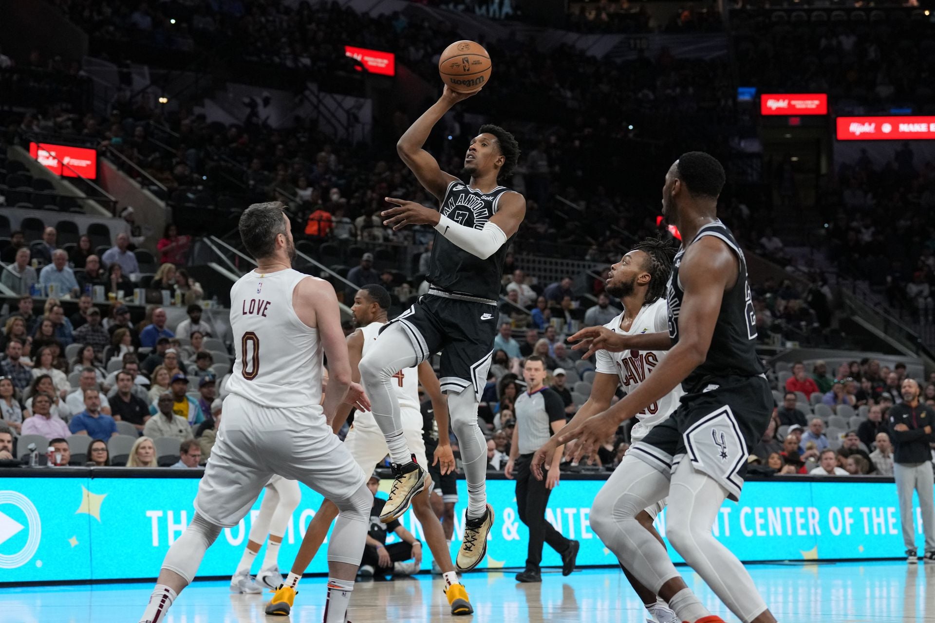 San Antonio Spurs guard Josh Richardson (7) shoots over Cleveland Cavaliers forward Kevin Love (0) in the first half at the AT&T Center in San Antonio, Texas,  Dec. 12, 2022.
