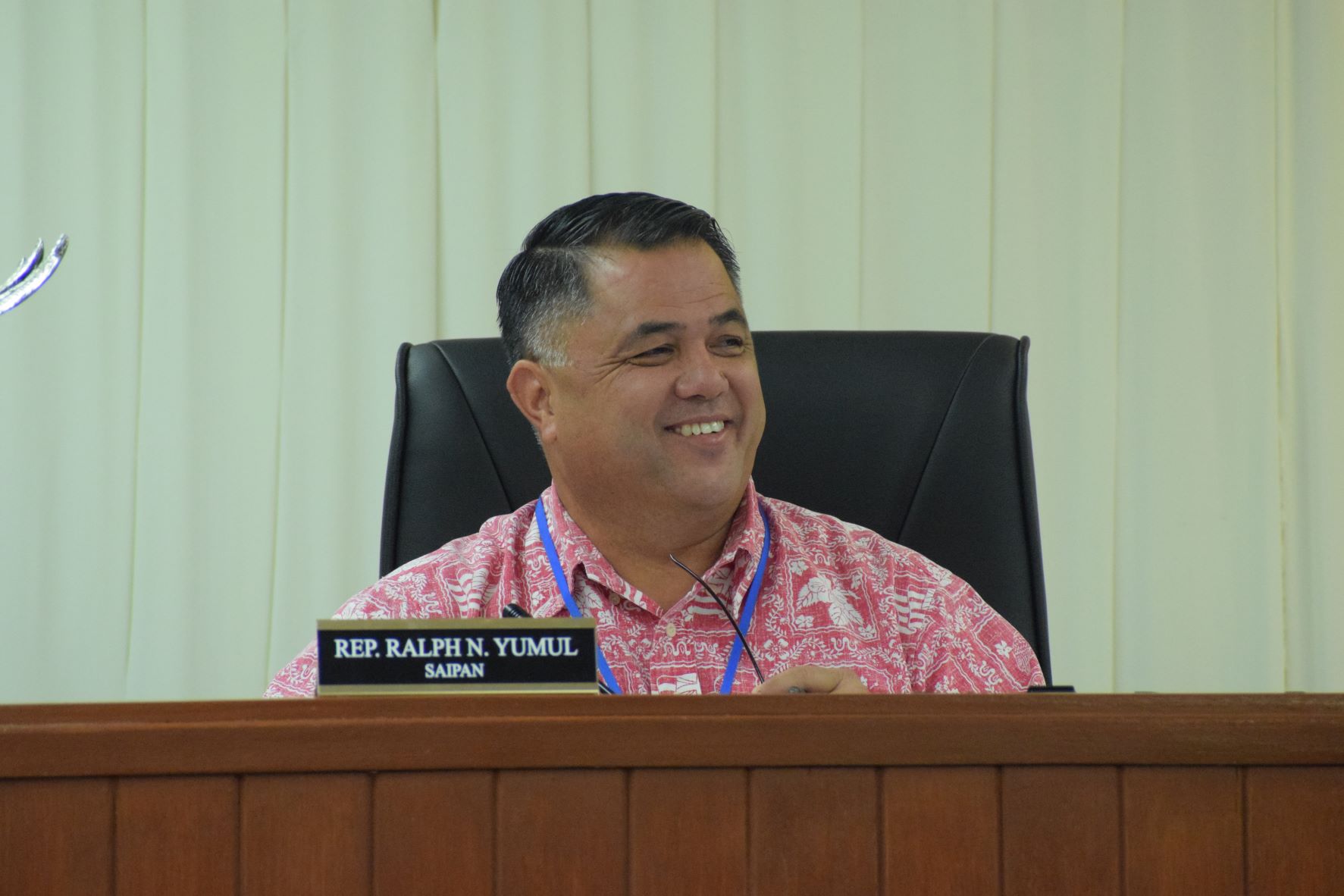 House Floor Leader Ralph N. Yumul smiles during a House session on Wednesday.