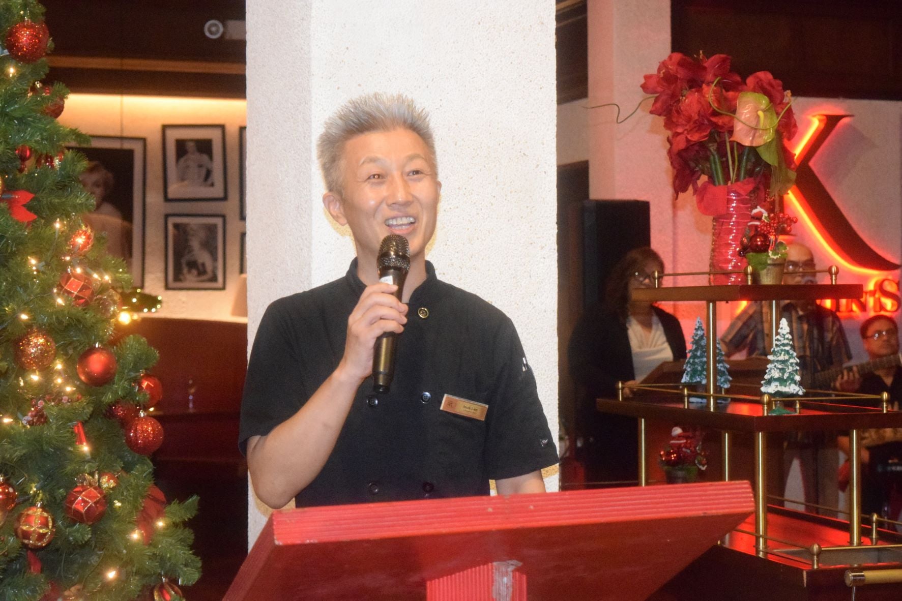 Kevins Prime Rib & Seafood's Chef Inok Lee welcomes guests during the restaurant’s reopening and fifth anniversary celebration at Aqua Resort Club on Dec. 1, 2022.