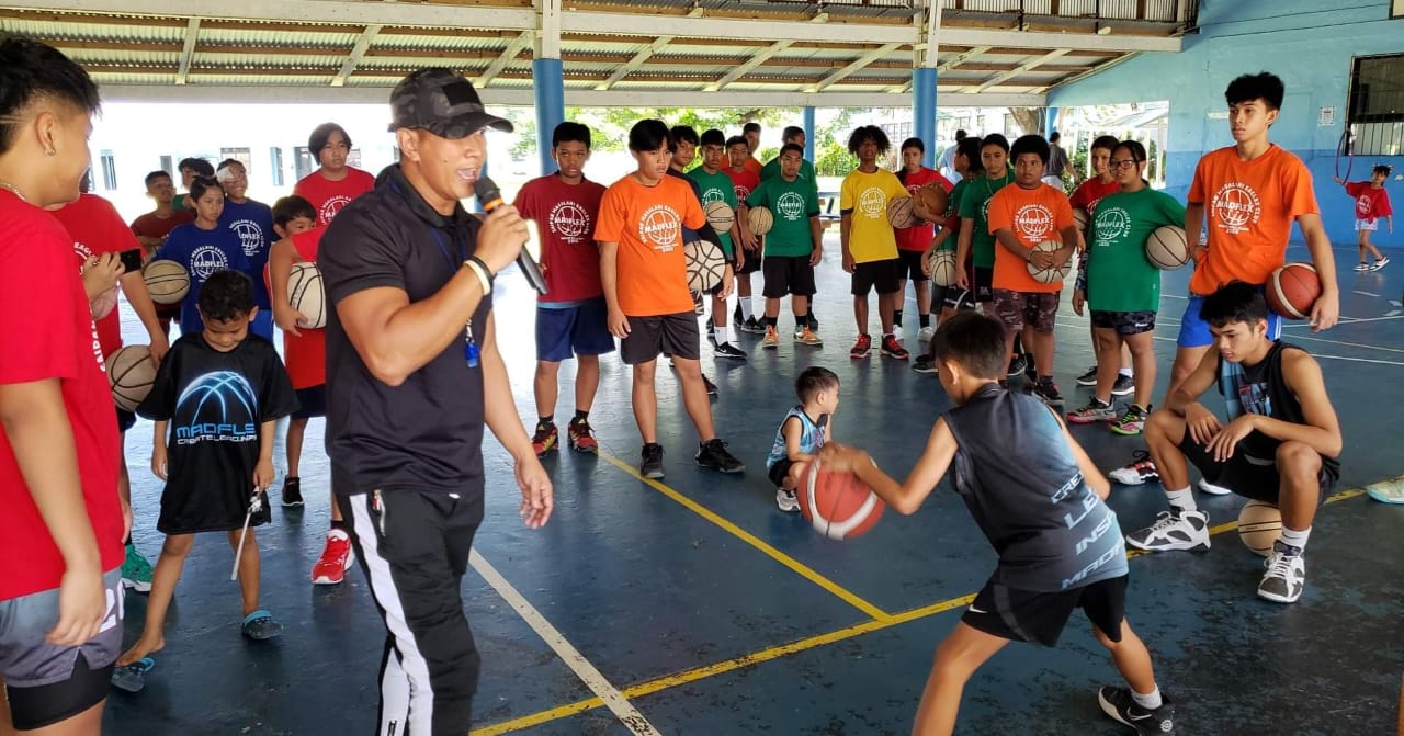 Derek, the son of MadFlex founder Dexter Tenorio, gives a dribbling demonstration.