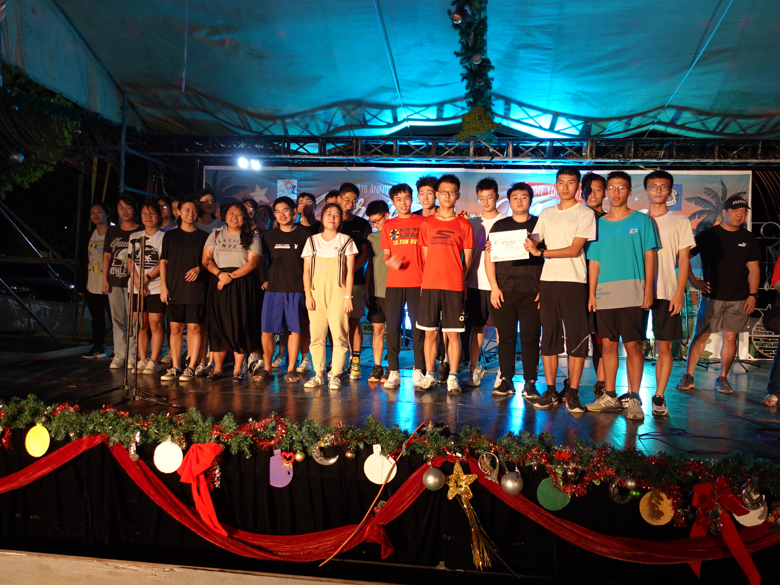 Agape Christian School is awarded third place and $300 for middle school caroling competition the 18th Annual Christmas in the Marianas on Dec. 17, 2022, in Garapan, Saipan.