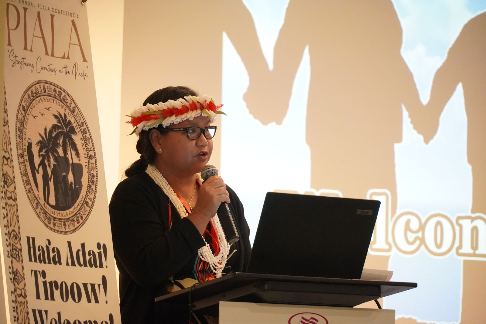 PIALA President and Joeten-Kiyu Public Library director Erlinda C. Naputi gives her welcoming remarks.