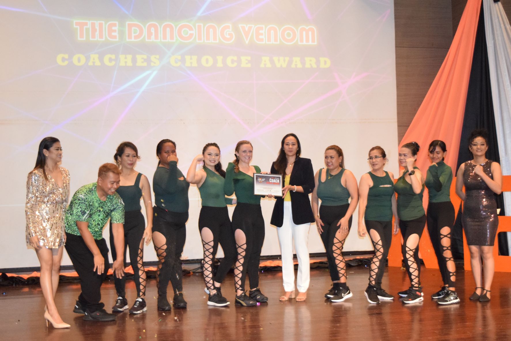 The members of Dancing Venom with Joeten Motors President Somia Quan, center, M2 Fitness co-founders Mary Grace Bautista, left, and Mita Pelicano, right.