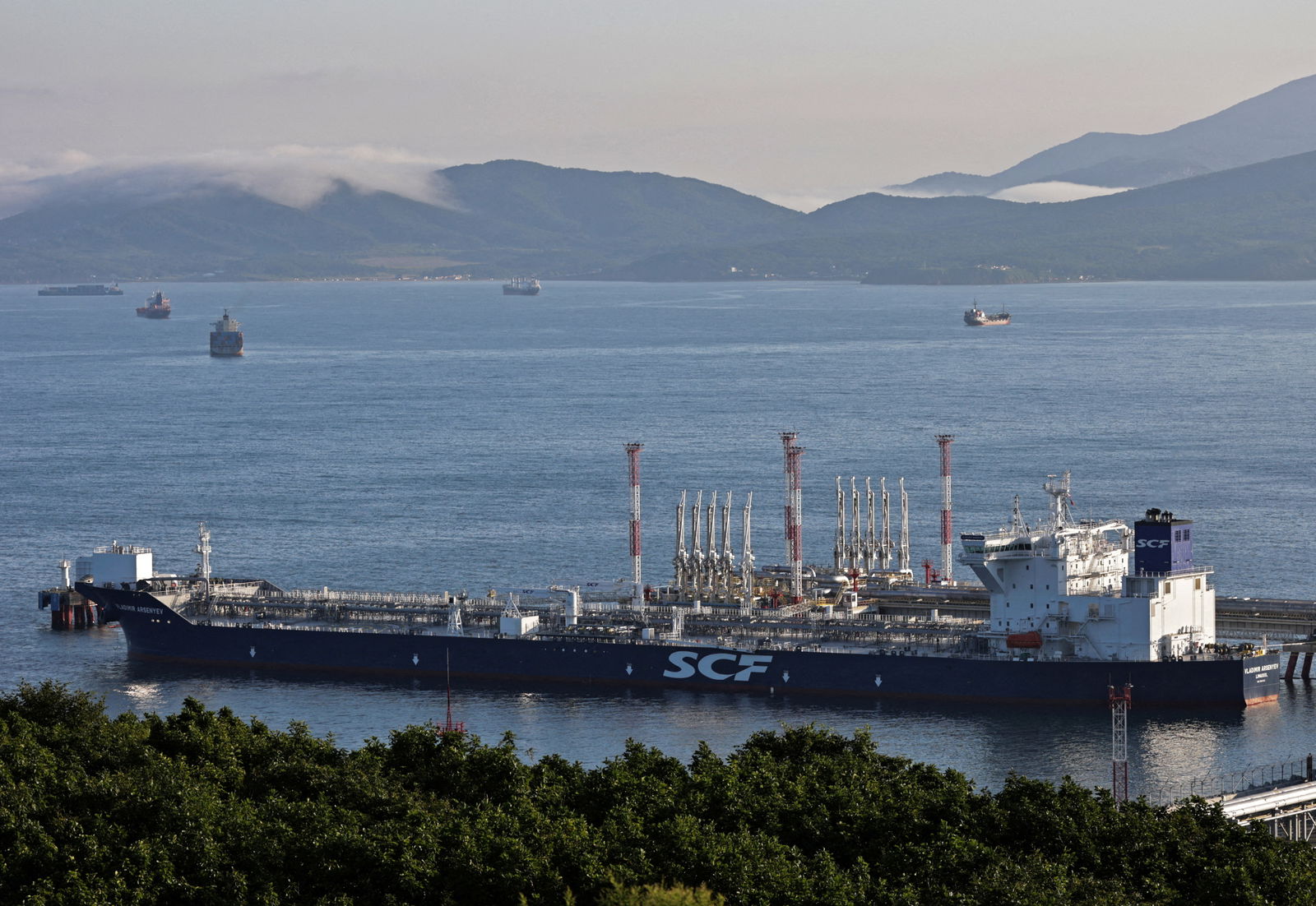 An aerial view shows the Vladimir Arsenyev tanker at the crude oil terminal Kozmino on the shore of Nakhodka Bay near the port city of Nakhodka, Russia, Aug. 12, 2022.