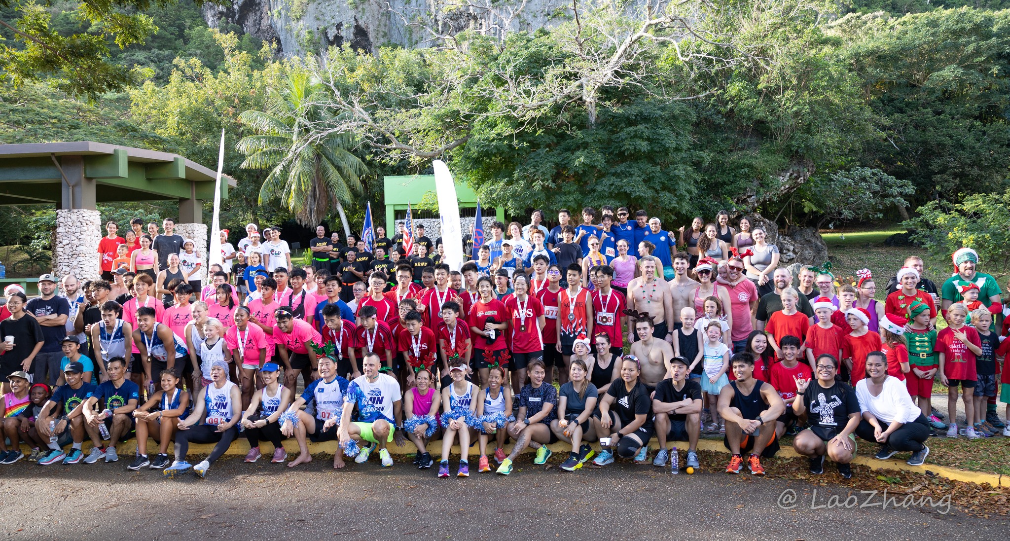 The participants of Northern Marianas Athletics’ Annual Christmas Island Relay pose for a group photo Saturday at the Last Command Post in Marpi.