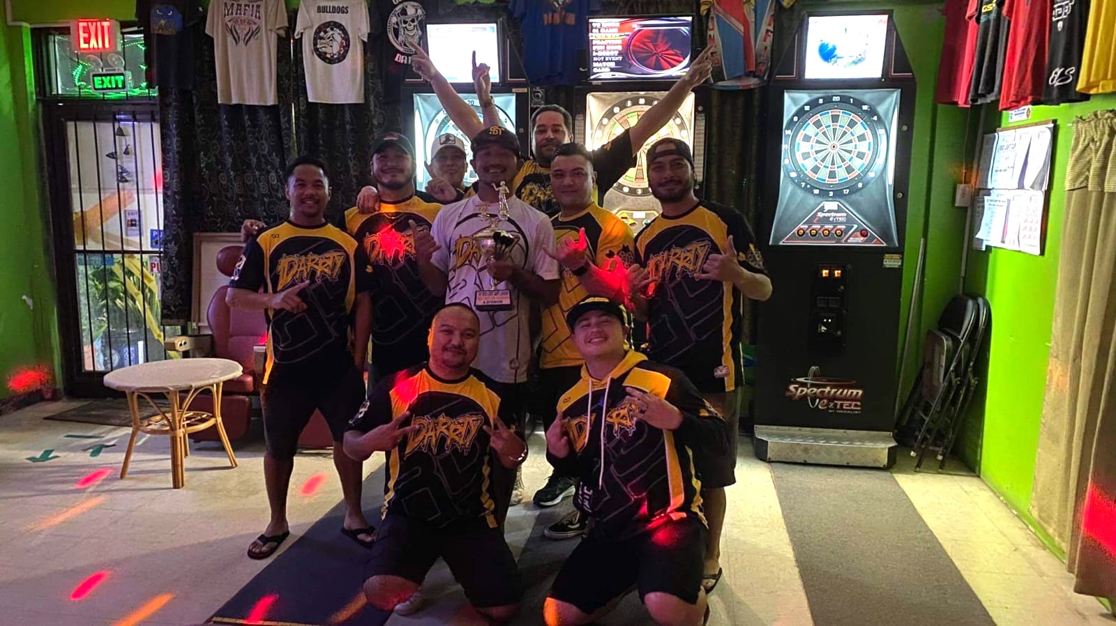 Jonny's Ridin Darrty team members pose for a photo after winning the “A” Division title of the SEDA Bud Light Dart League on Monday at 6JMS Sports Bar.