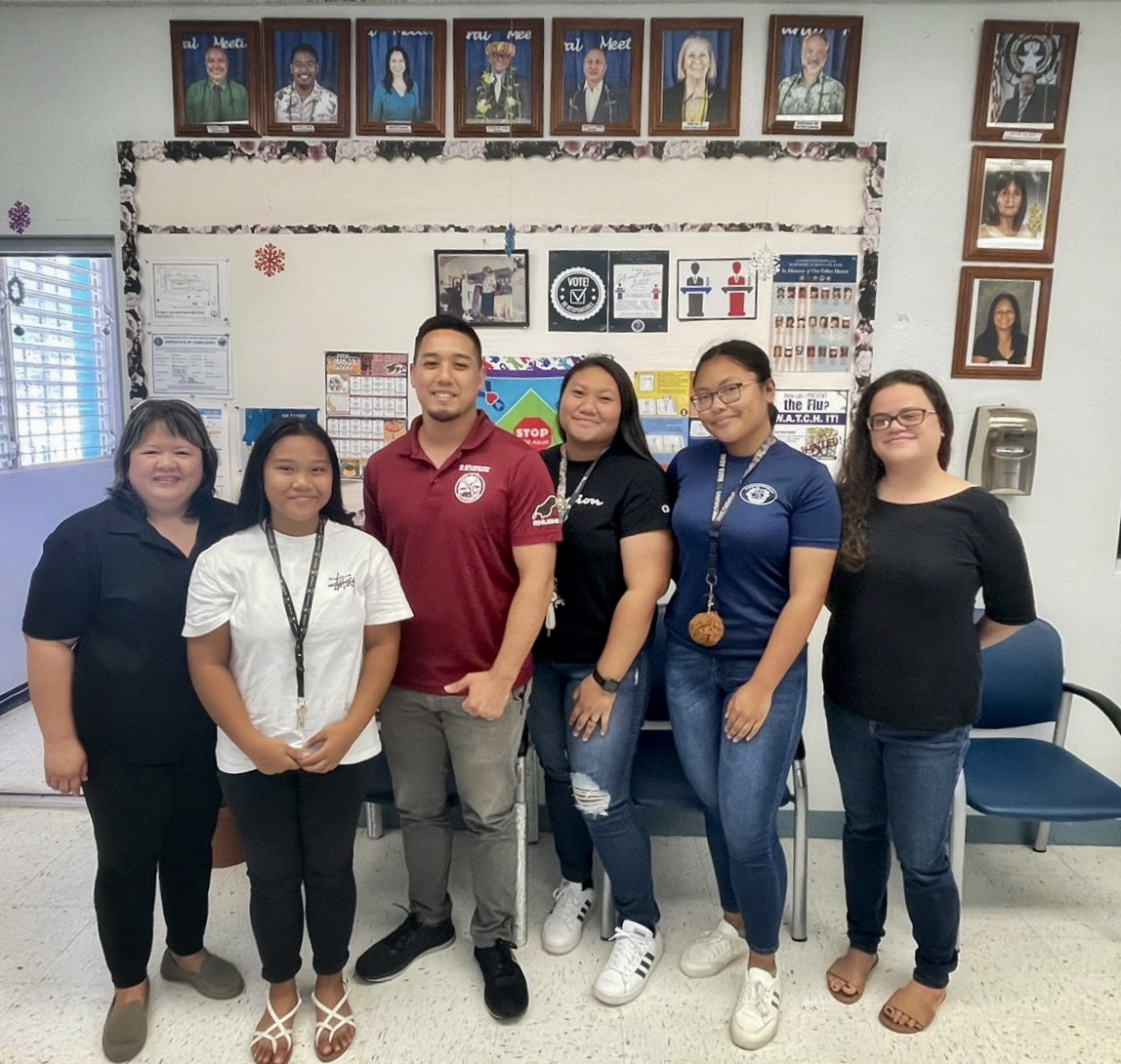 Senior Director for Accountability, Research and Evaluation Dr. Rizalina Liwag, left, and Rota public schools’ tutors.