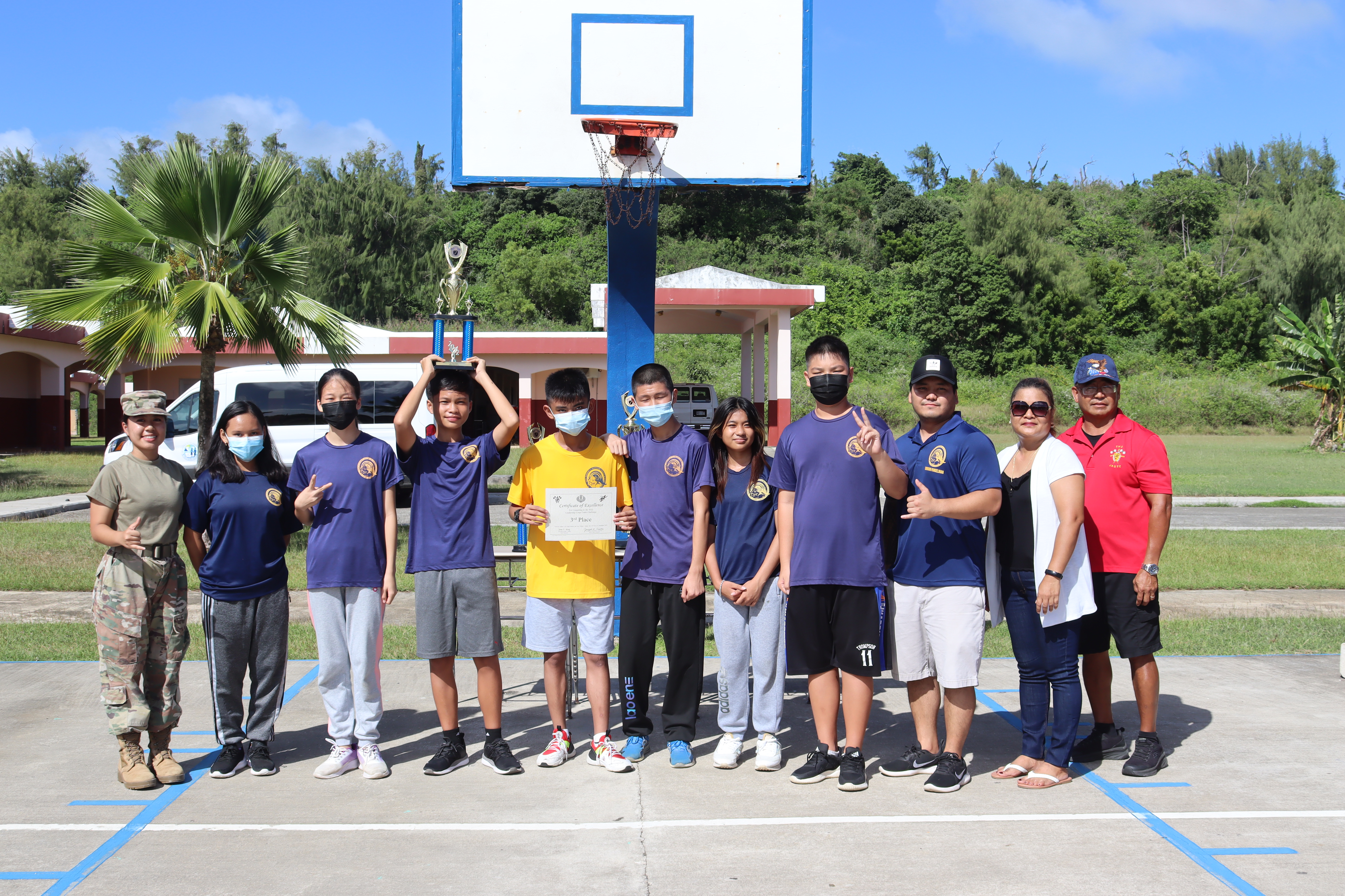 Hopwood Middle School students pose with their trophy after winning 3rd place in the competition.
