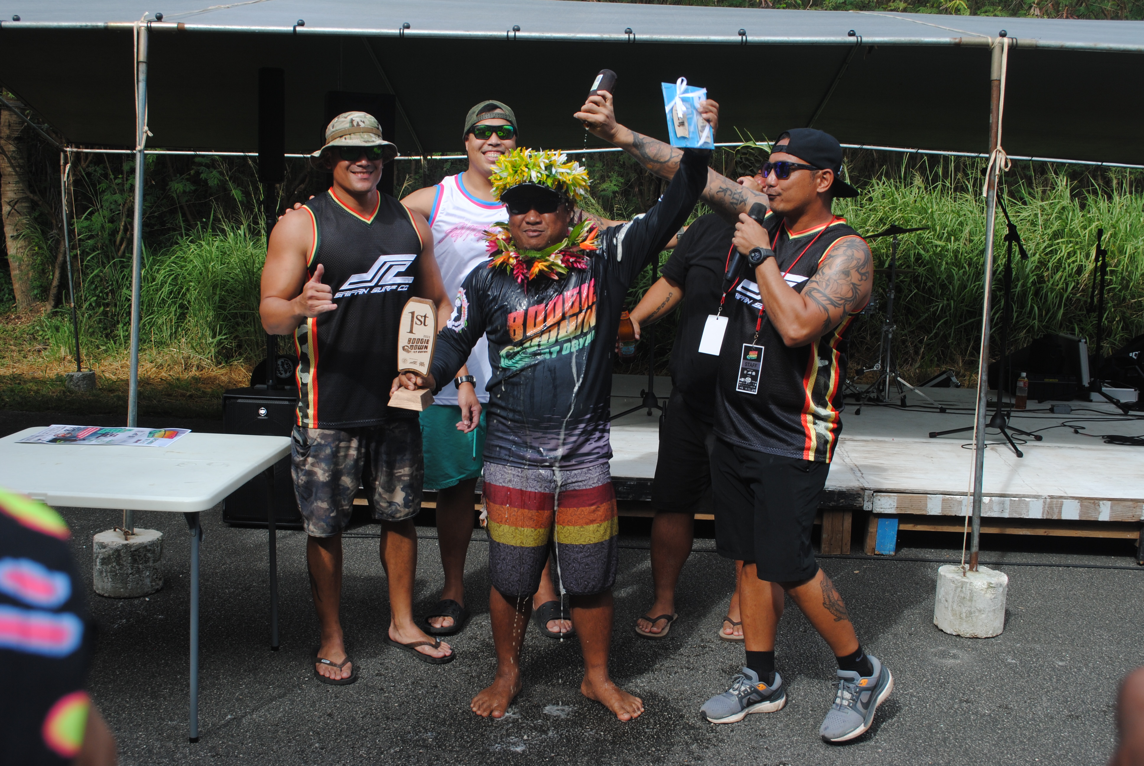 Frank Ramon, center, is the winner of the first Boogie Down at Obyan surfing competition which was held over the weekend at Obyan Beach.