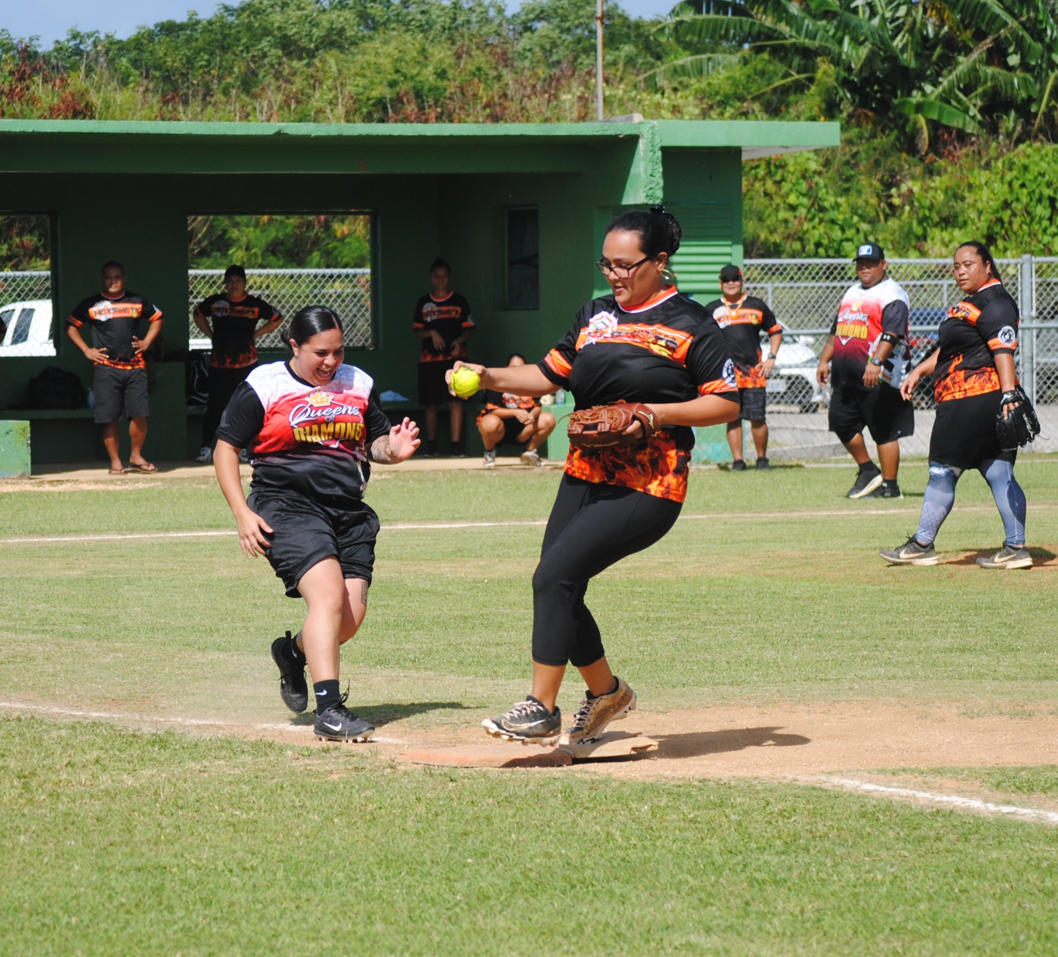 Hotshots first baseman Janica Lizama races to touch the base for the out.