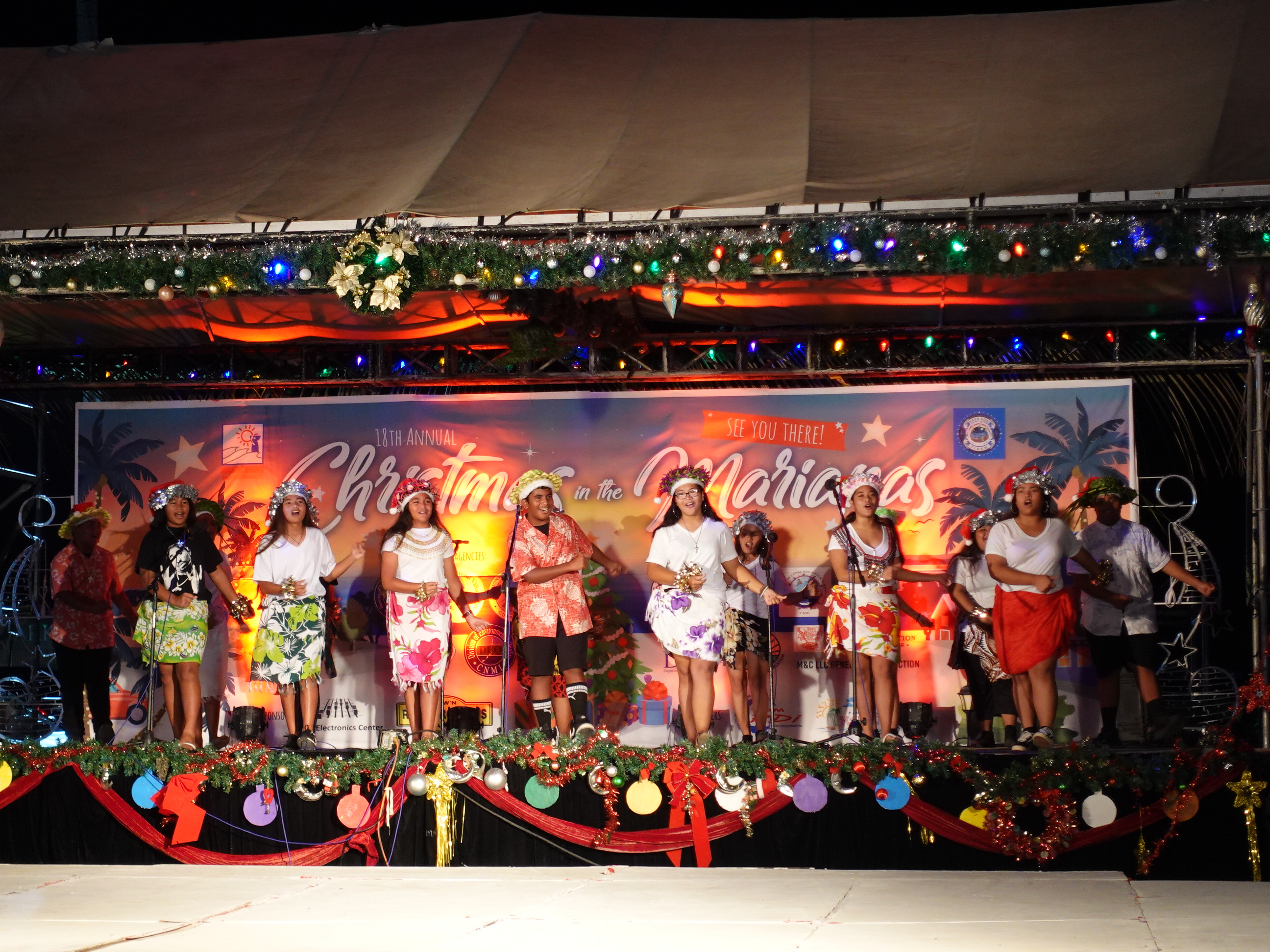 Tanapag Middle School performs at the 18th Annual Christmas in the Marianas on Dec. 10, 2022, at Garapan Fishing Base, Saipan. The event continues on Dec. 17, 2022, with a Christmas Parade throughout downtown Garapan and the Guam Army National Guard 721st Army Rock Band.
