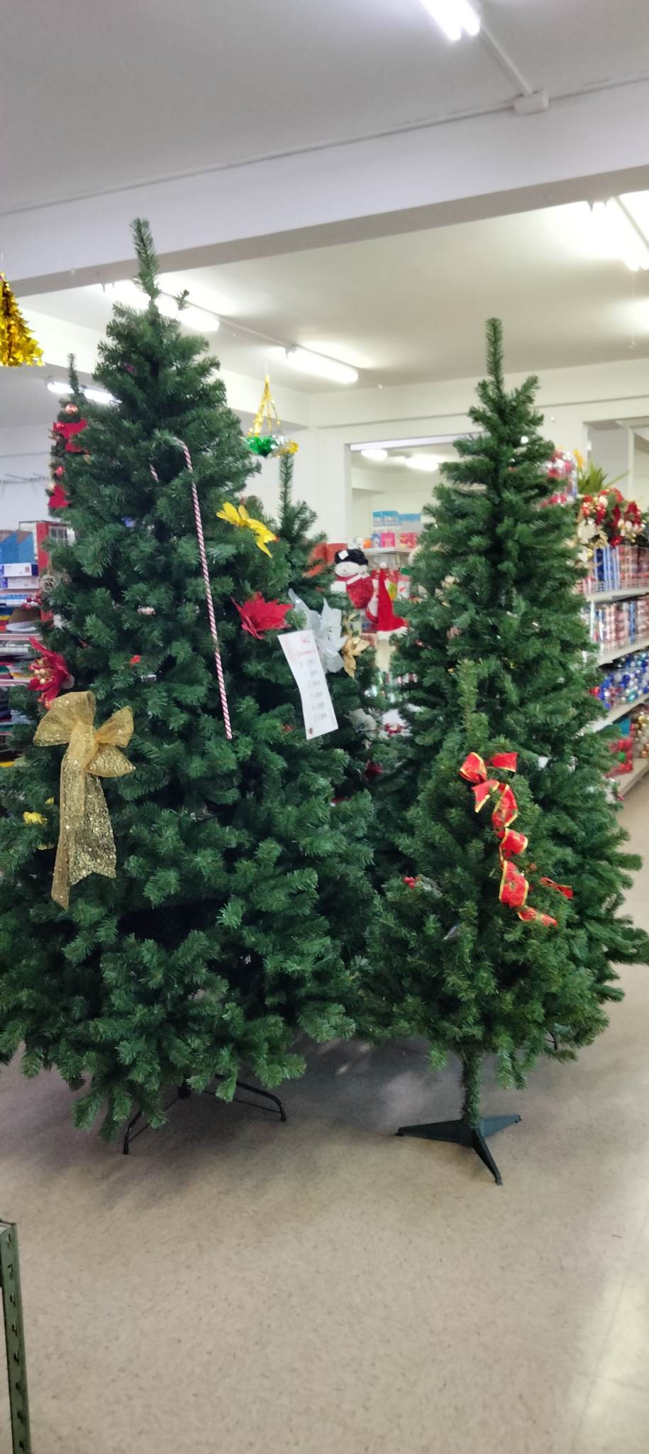 Modern Office Supply sells pre-decorated Christmas trees.
