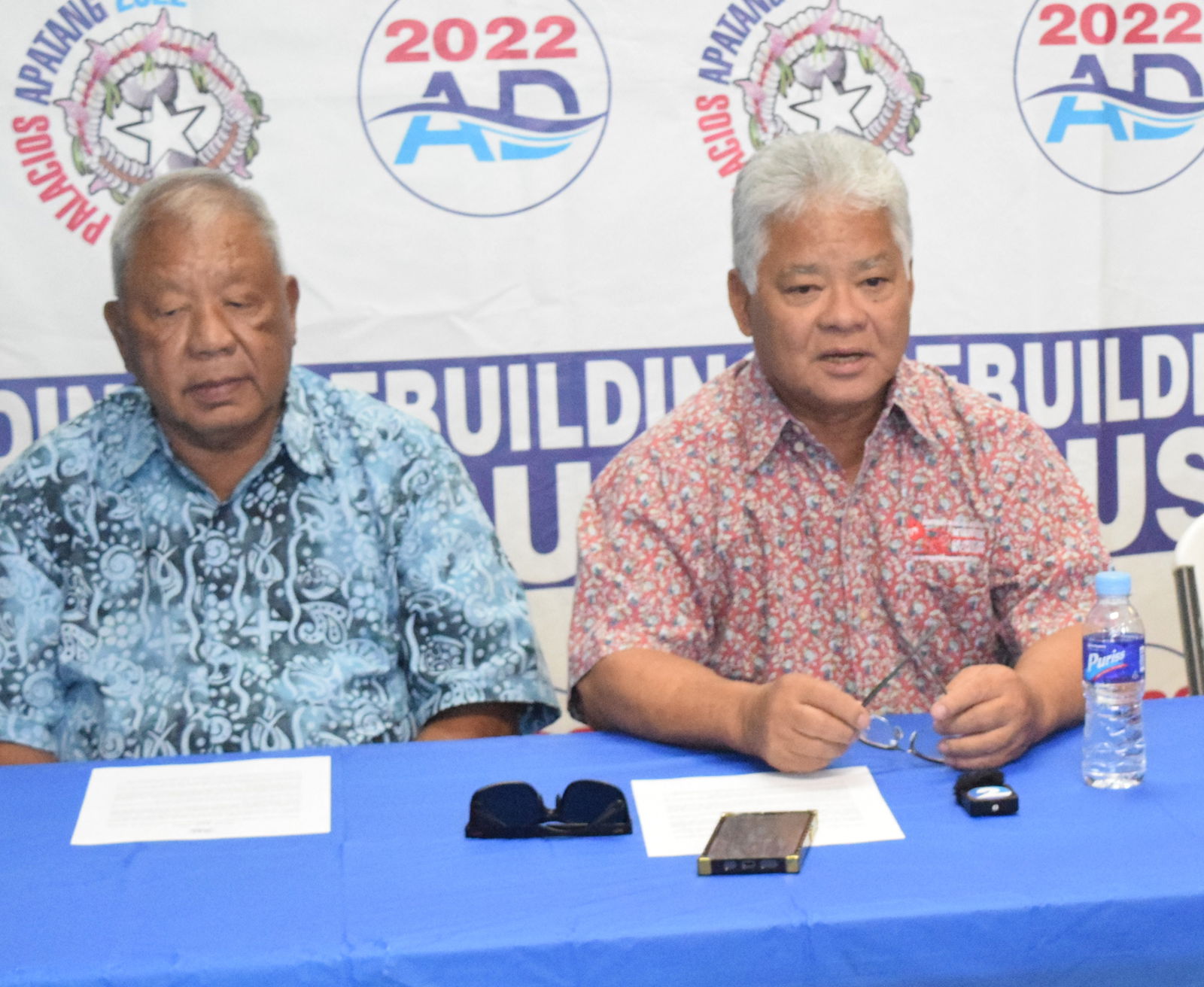 Governor-elect Arnold I. Palacios speaks to members of the media as Lt. Gov.-elect David M. Apatang listens during a press conference at the AD 2022 headquarters in Garapan on Monday.