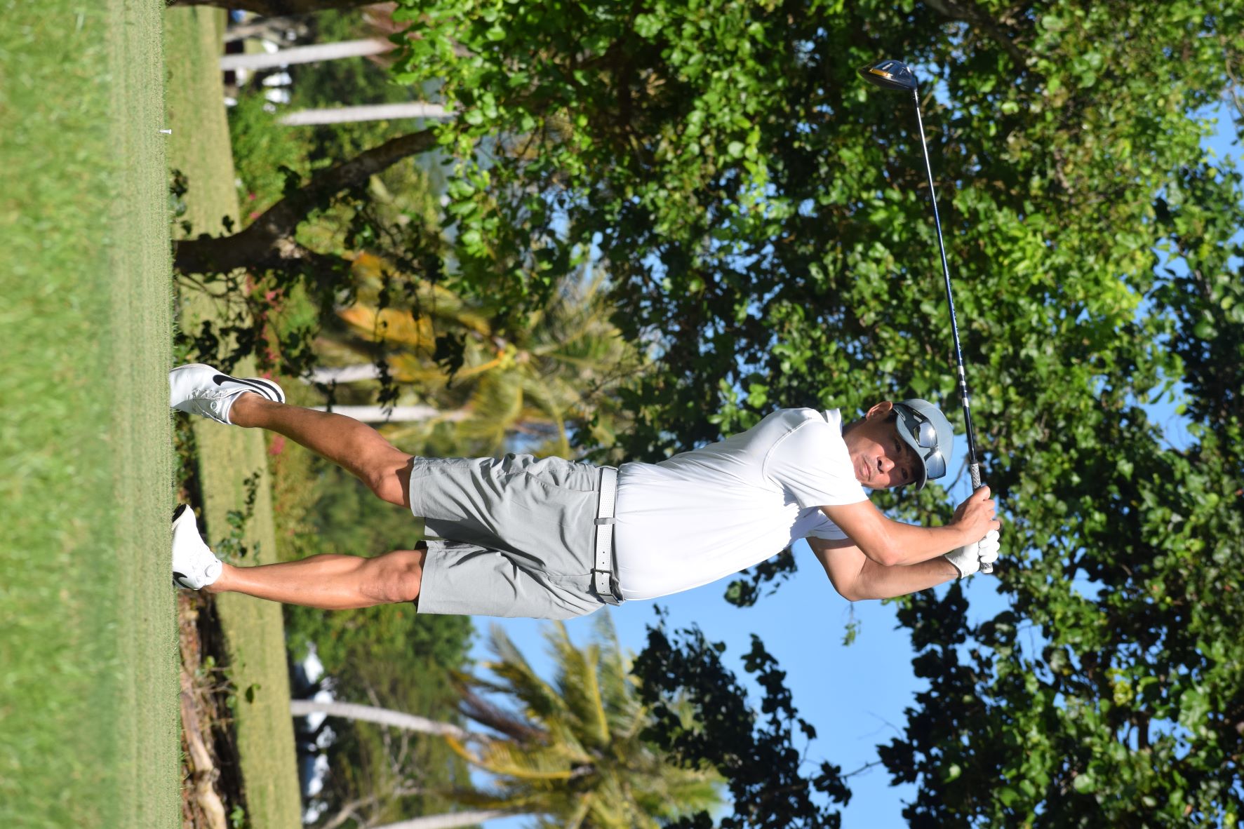 Kang Sun Ho tees off for Hole No. 12 during  McDonald's 2nd Annual Golf Classic at LaoLao Bay Golf & Resort's East Course on Saturday.