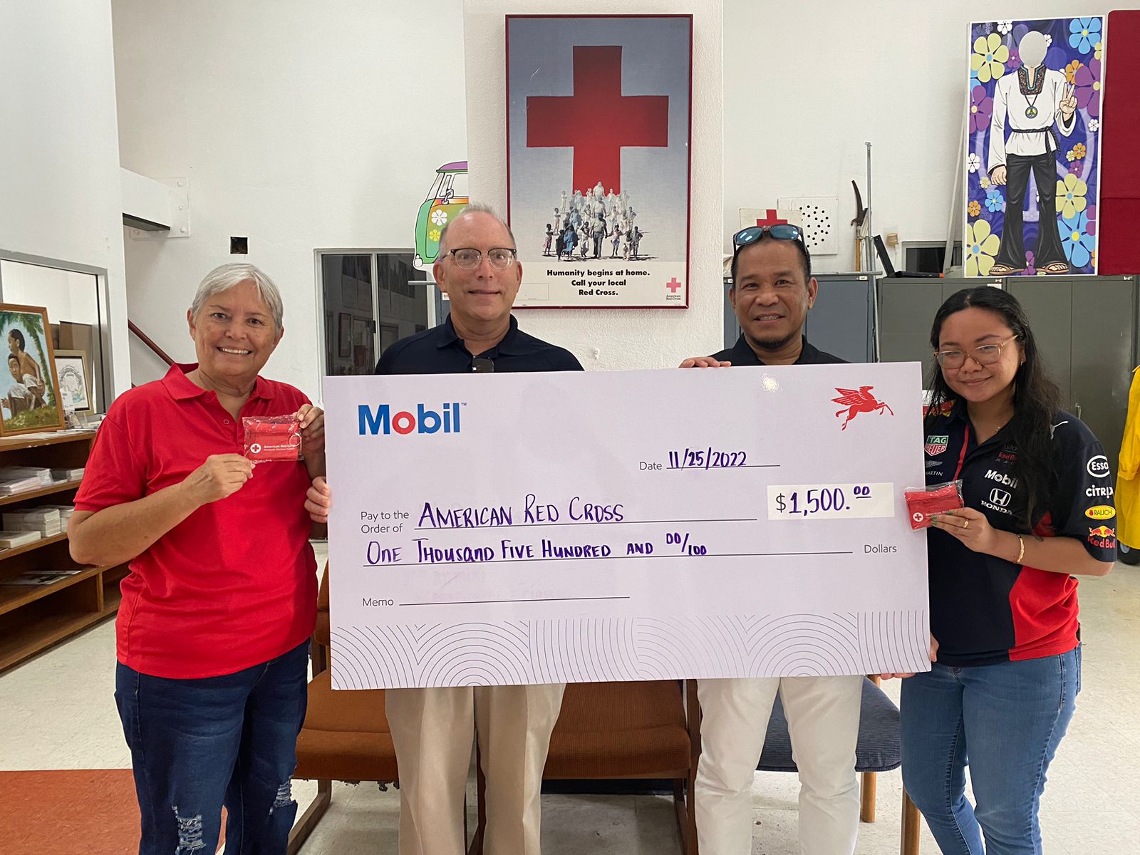 Mobil Oil Mariana Islands Inc. made a generous $1,500 cash donation to the American Red Cross-NMI Chapter over the Thanksgiving holiday. From left, Jovita Flores, JEM Company operator; John Hirsh, executive director for the American Red Cross-NMI Chapter; Sergio Alves, retail manager, Mobil Oil Guam Inc.; and Malaina Kileleman, retail territory manager Saipan.