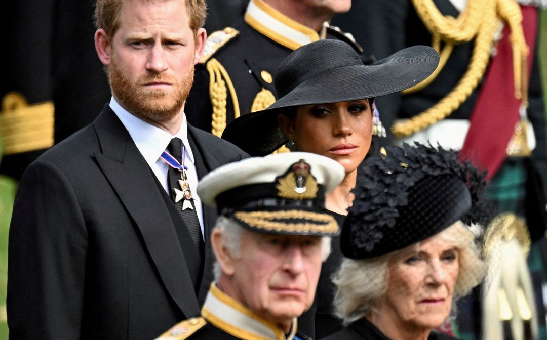 Britain's Meghan, Duchess of Sussex, cries as she, Prince Harry, Duke of Sussex, Queen Camilla and King Charles attend the state funeral and burial of Britain's Queen Elizabeth II in London, Britain, Sept. 19, 2022.