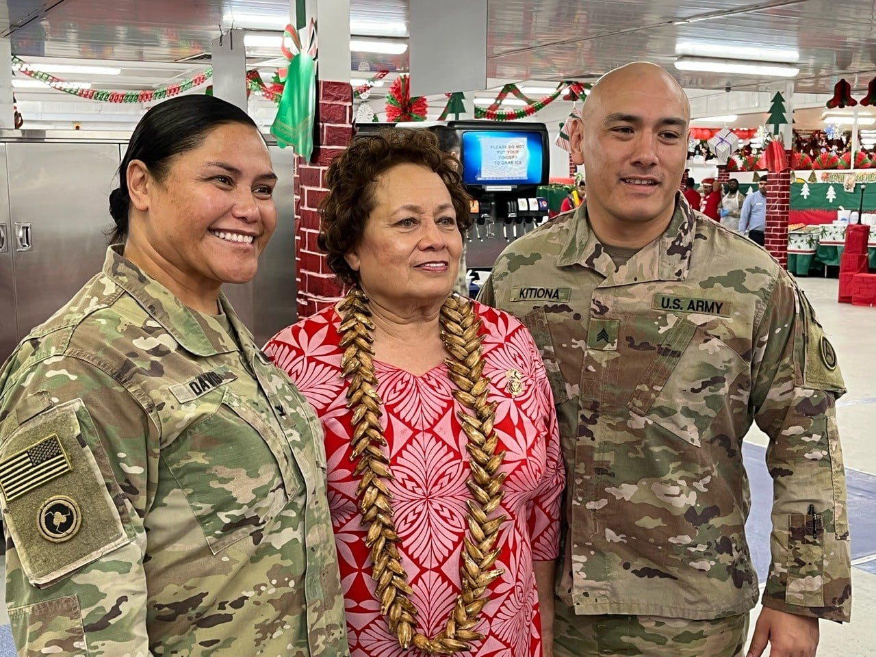 U.S. Congresswoman Uifa’atali Amata with Col. Manu Davis and Sgt. Christopher Kitiona in Kuwait.