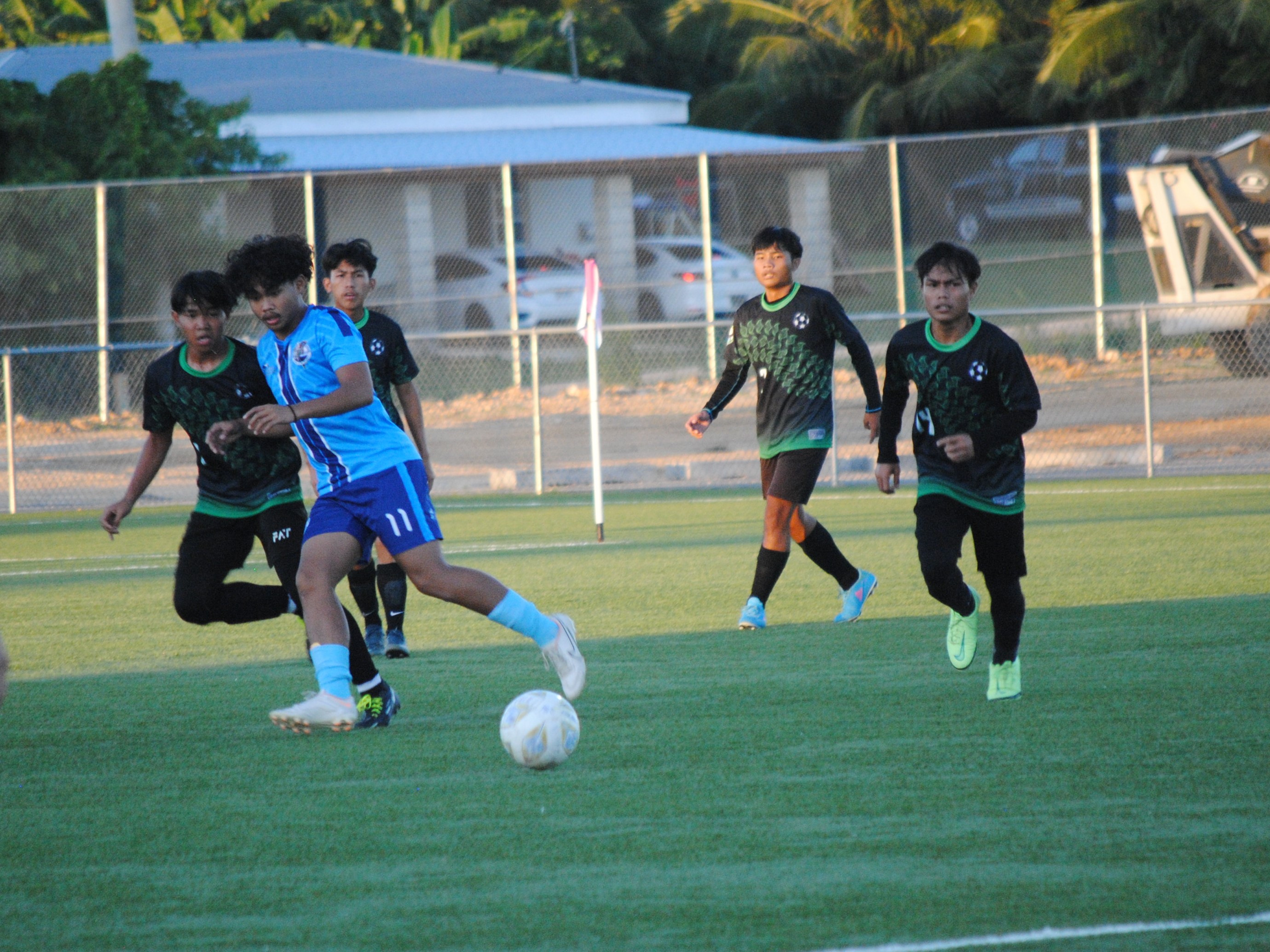 MHS' Brian Lubao looks on as he sets up the possession during the boys high school division championship match of the NMIFA-PSS Interscholastic Soccer League on Tuesday at the NMI Soccer Training Center.
