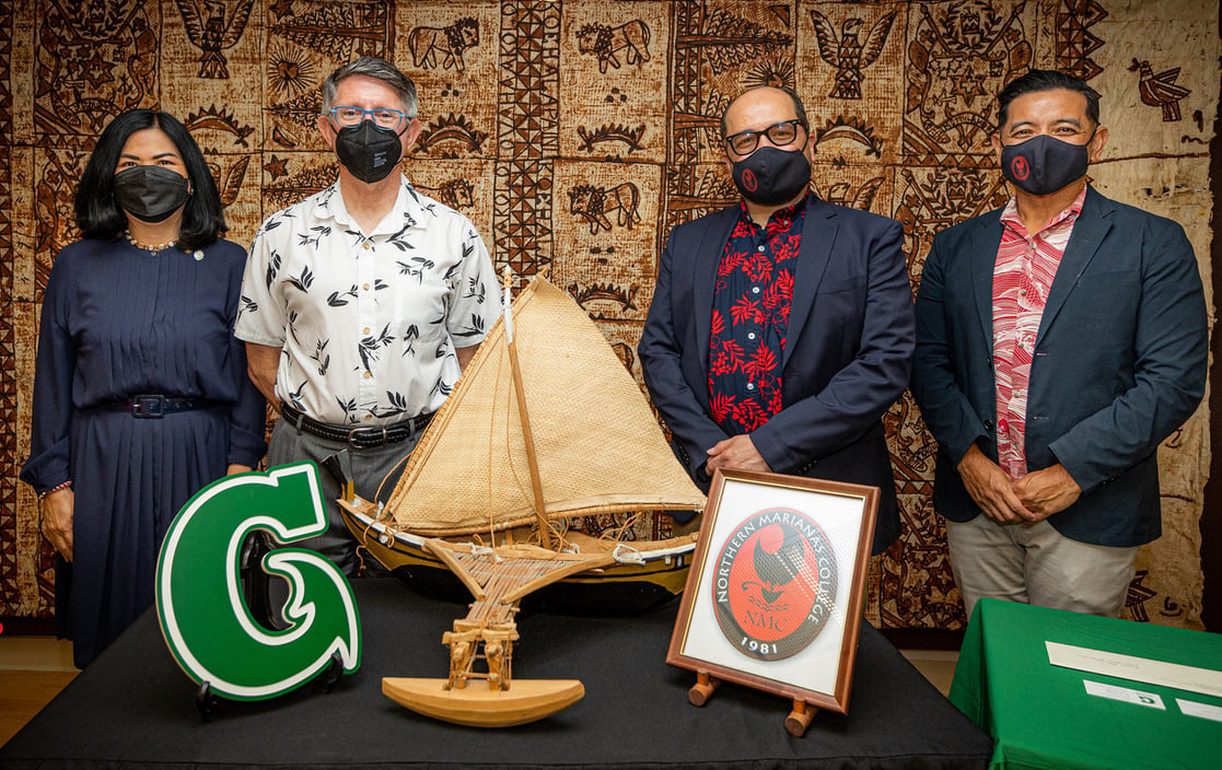Officials of the University of Guam and Northern Marianas College celebrate the formal signing of UOG Press’s newest imprint, Proa Publications, in February 2022 at UOG. From left, UOG Senior Vice President and Provost Anita Borja Enriquez, UOG President Thomas W. Krise, NMC President Galvin Deleon Guerrero, and NMC Vice President Frankie Eliptico.