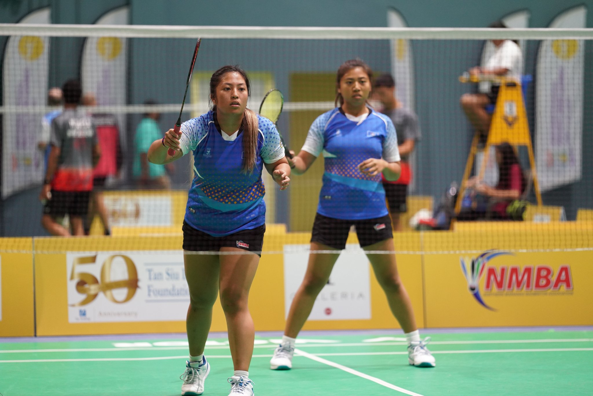 The NMI’s Janelle Pangilinan, left, and Jen Savellano wait for their opponent’s shot during the women’s doubles game in the Northern Marianas Pacific Mini Games held in June 2022 at the Gilbert C. Ada Gymnasium.