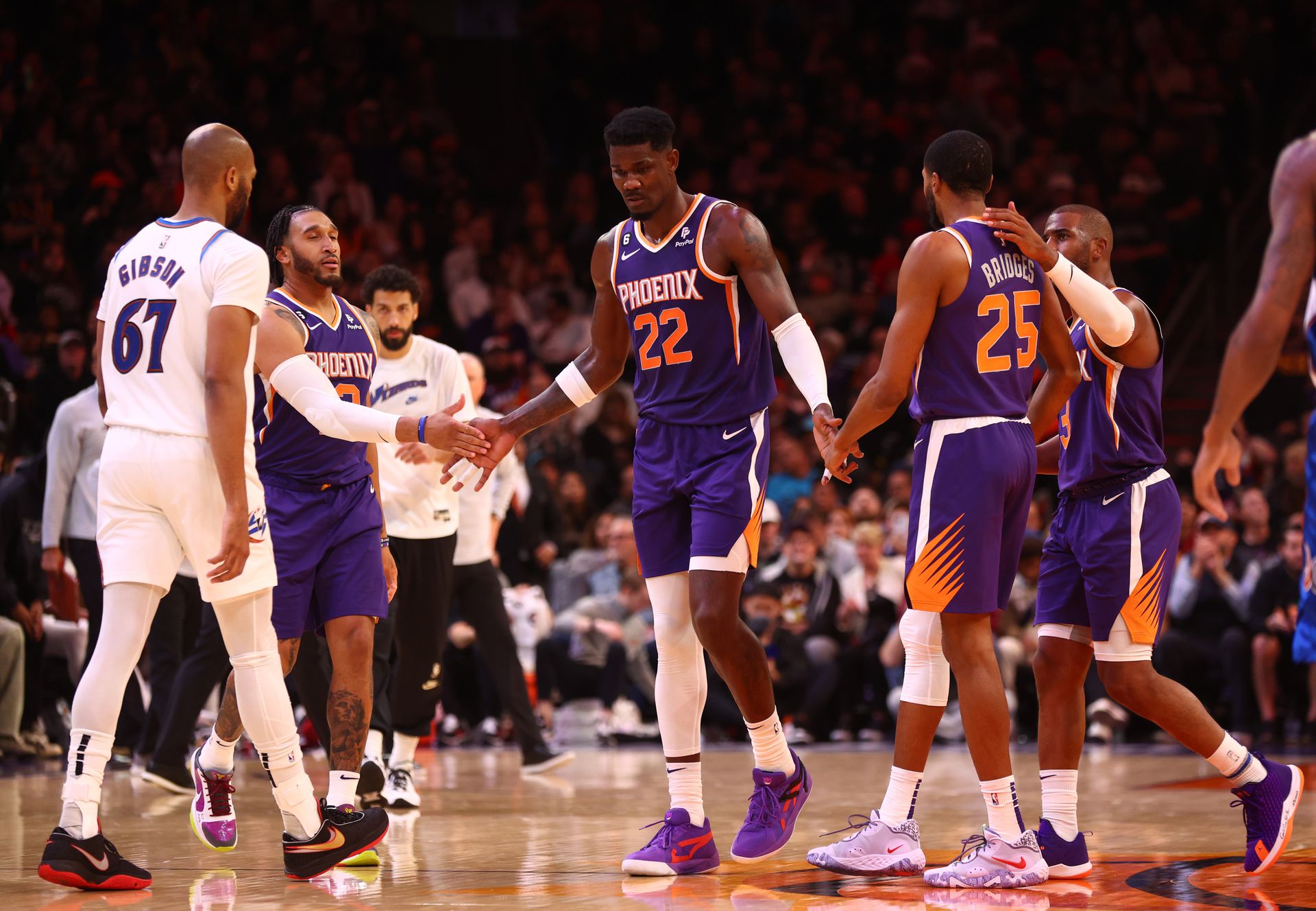 Phoenix Suns center Deandre Ayton (22) celebrates with teammates against the Washington Wizards in the second half at Footprint Center in Phoenix, Arizona, Dec. 20, 2022.