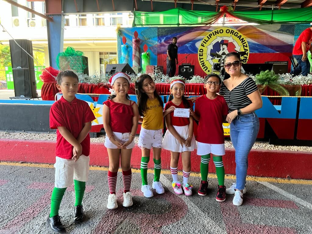 The Amazing Kids dance group with competition judge Daisy Sablan.