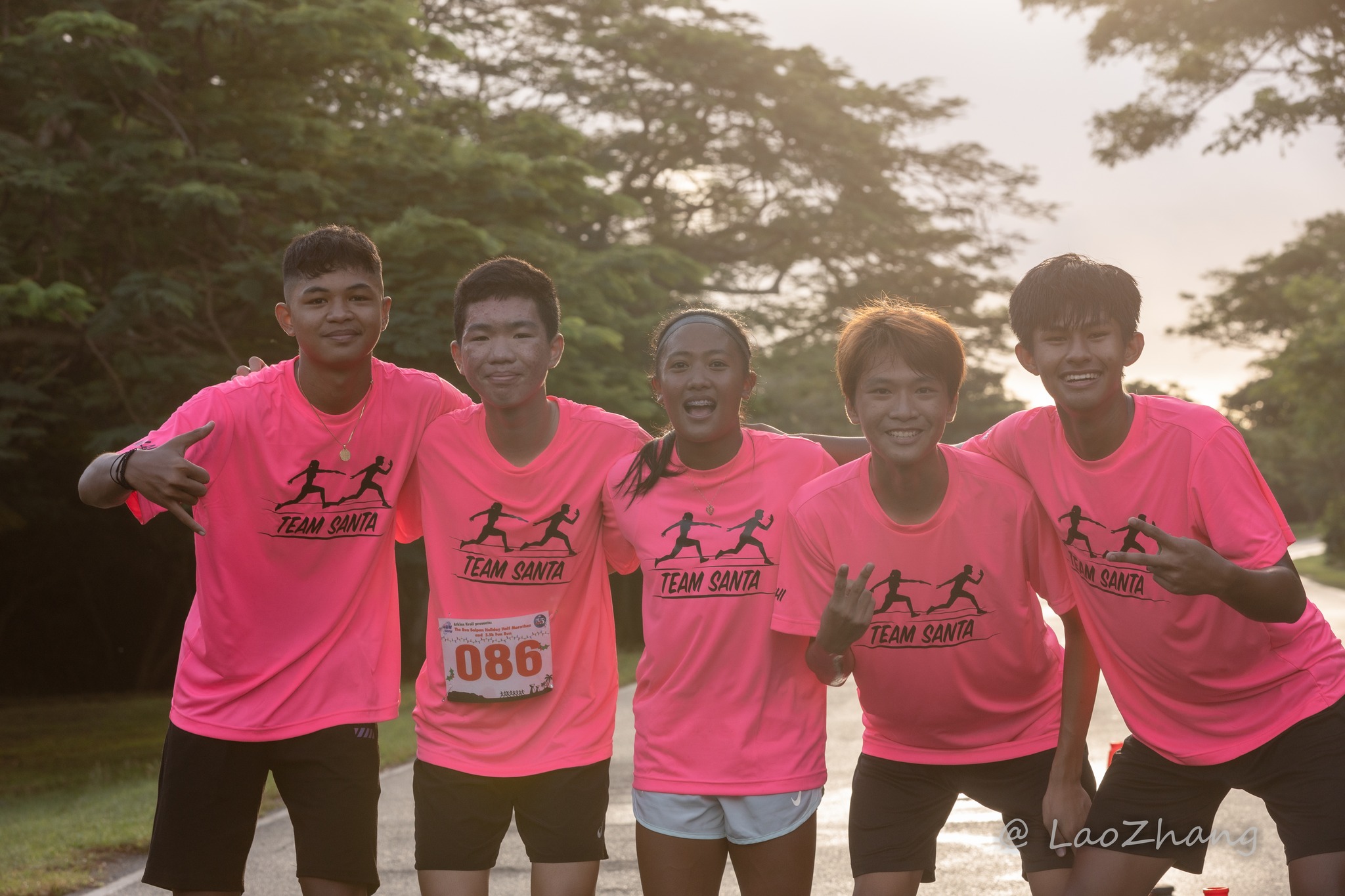 Team Santa members pose for a photo after completing the 2022 NMA Annual Christmas Island Relay at the Last Command Post on Saturday.