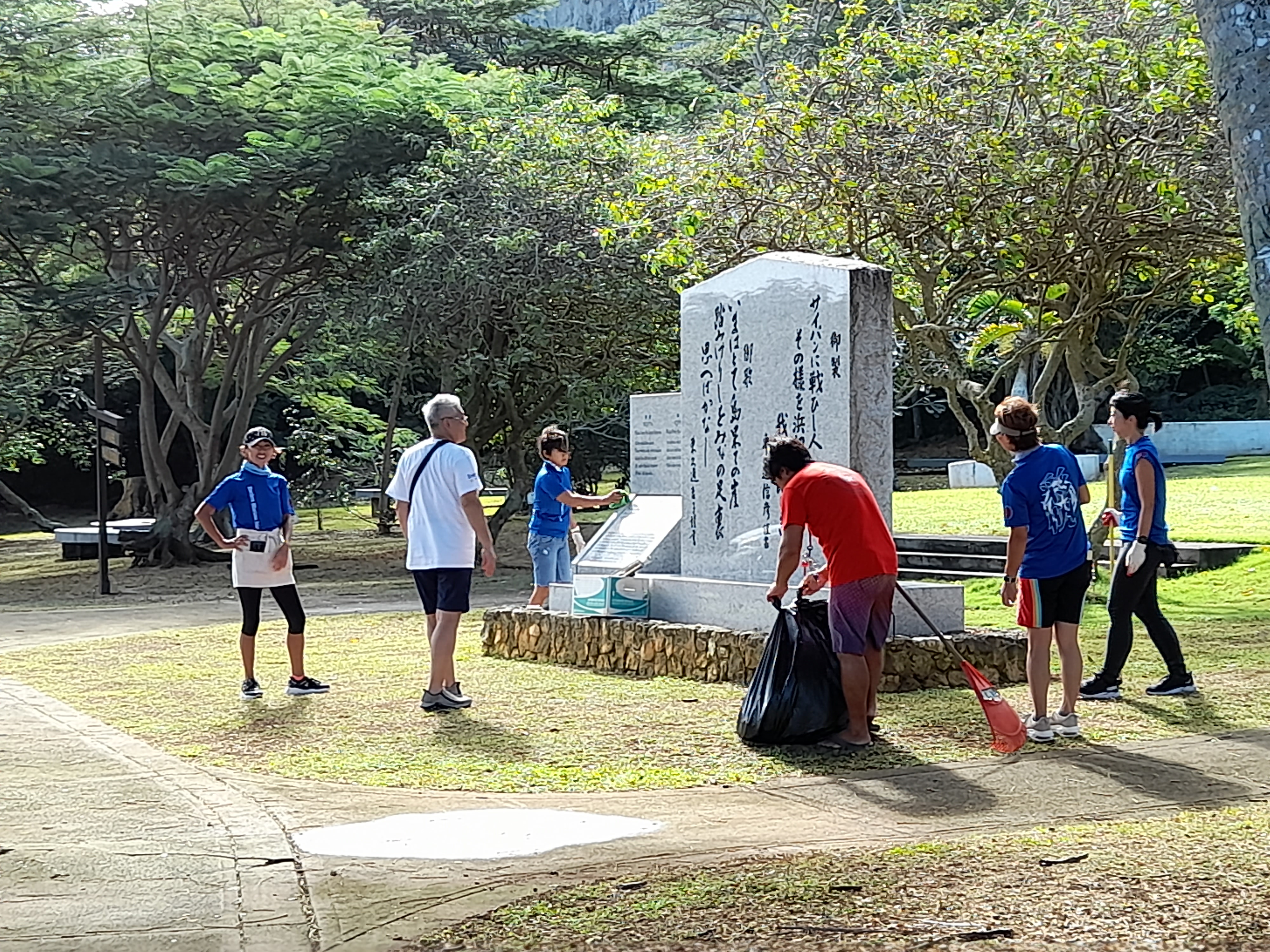 Representatives of 12 local businesses and offices join the Japan Saipan Travel Association and the Japanese Society of the Northern Marianas in their annual cleanup in the Marianas on Dec. 17, 2022, held this year at the Japanese Peace Memorial and Okinawan Peace Memorial in Marpi, Saipan.