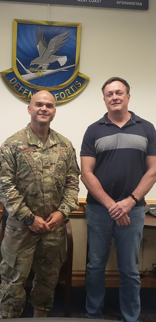 Former CNMI Veterans Affairs Office Executive Officer Stanley Iakopo  with  Andersen Air Force Base Anti-terrorism program manager Patrick Glasscock.