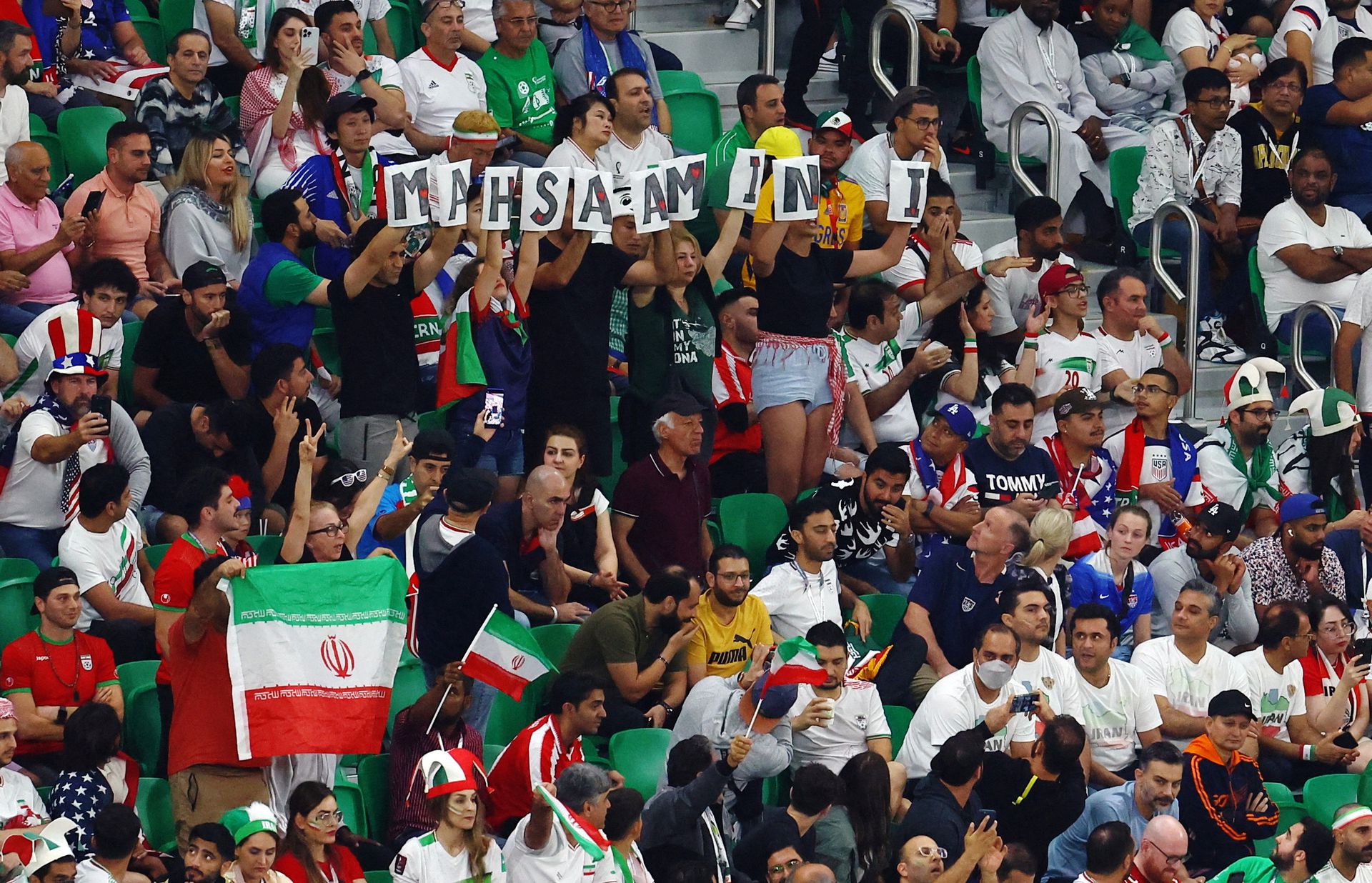 Iran fans display the name of Mahsa Amini in the stands during the World Cup match between Iran and the U.S. at Al Thumama Stadium in Doha, Qatar on Nov. 29, 2022.