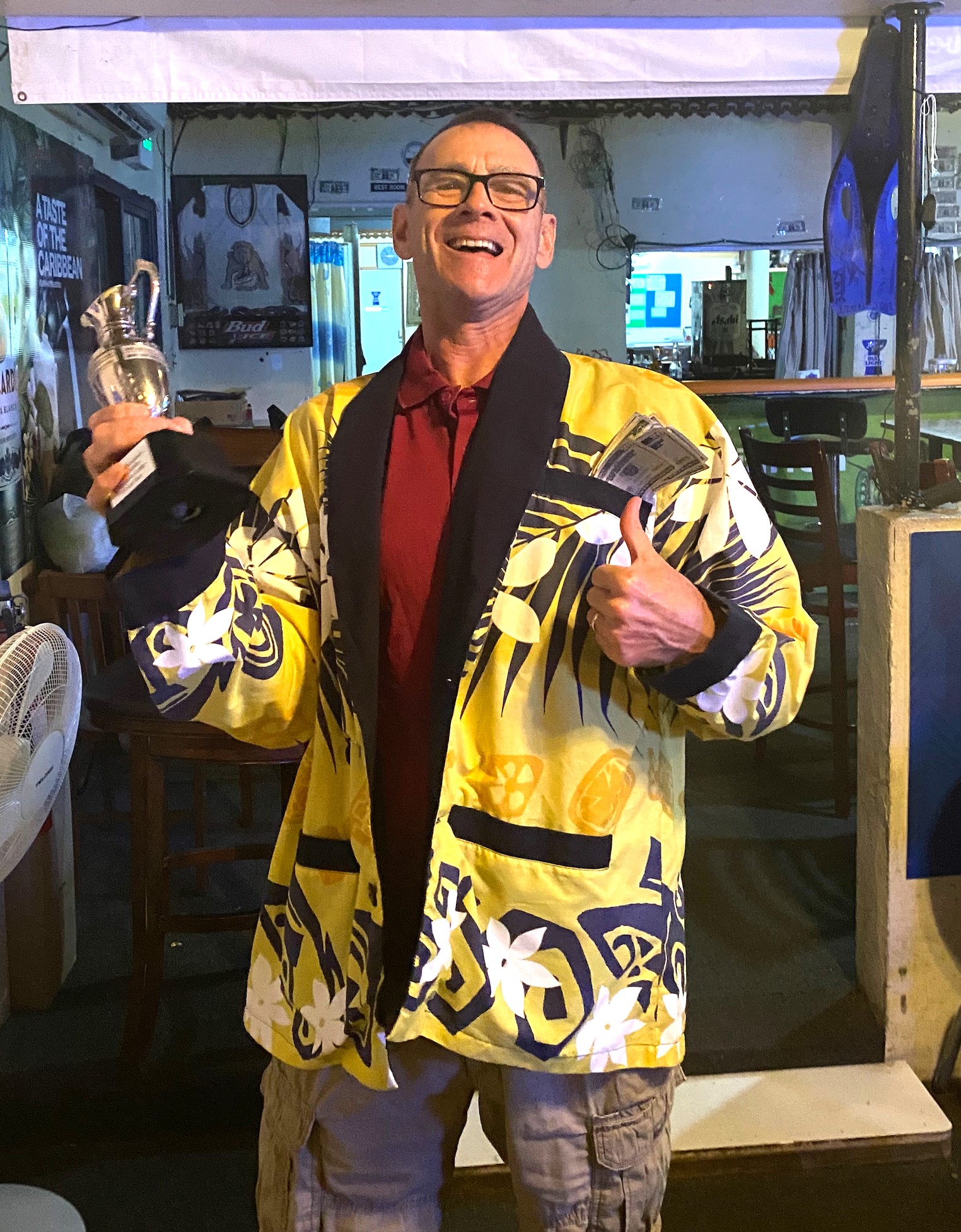 Champion Golfer of the Year Fossil with Jugge, prize money and Champion's jacket.