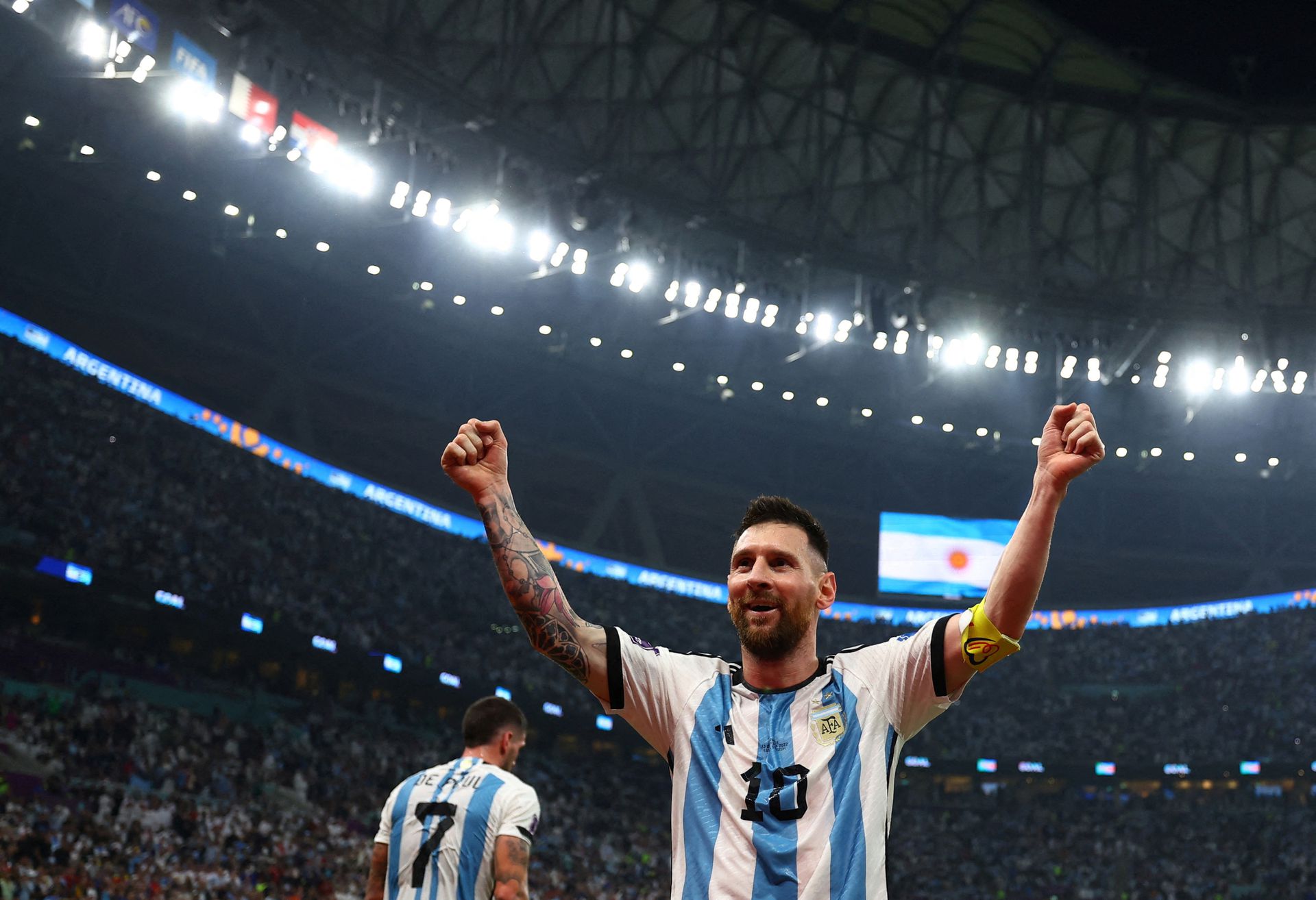 Argentina's Lionel Messi celebrates their third goal scored by Julian Alvarez in their semifinal match against Croatia at Lusail Stadium in Lusail, Qatar on Dec. 13, 2022.
