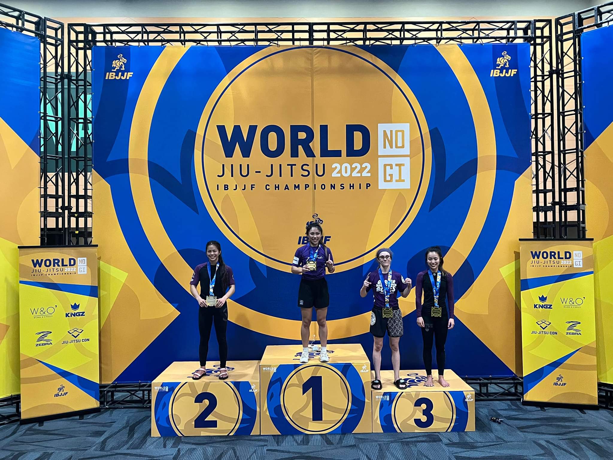 Marilyn Cruz, left, poses with her silver medal during the 2022 No-Gi World Championship held  Dec. 8-11 in California.