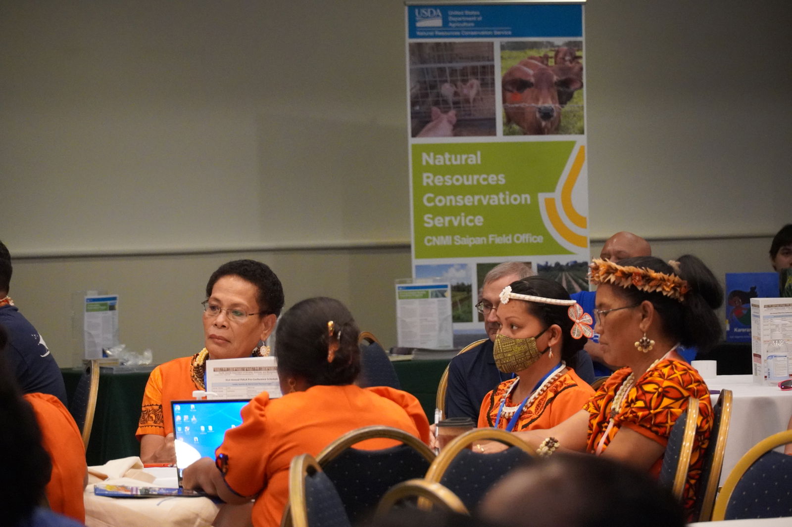 Delegates from the Marshall Islands listen to remarks made during the opening ceremony.