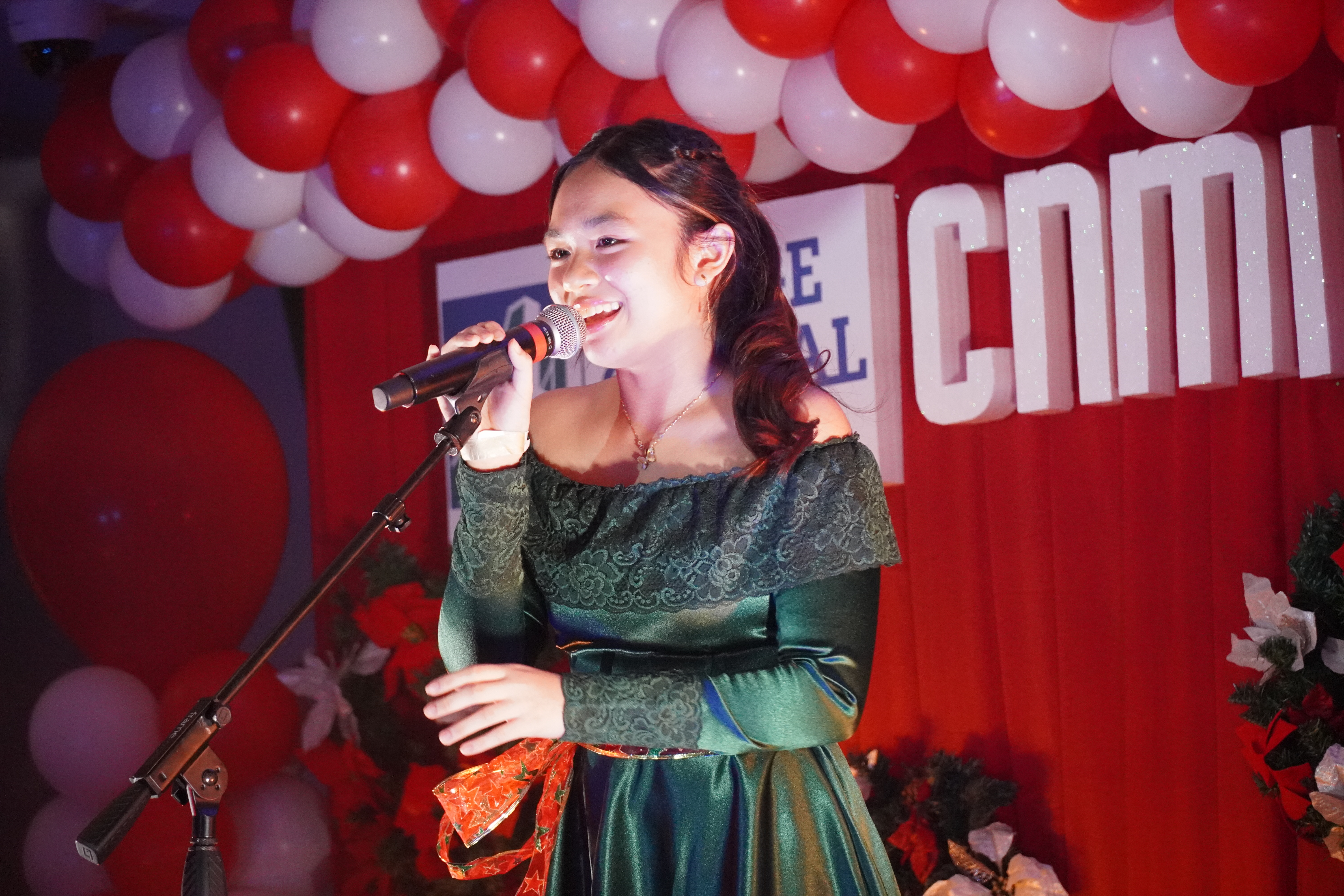 Past CNMI Got Talent champion Bernice Sabino serenades the audience with a Christmas mash-up.