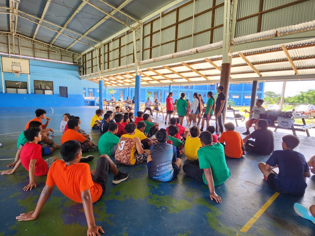The basketball clinic participants are briefed.