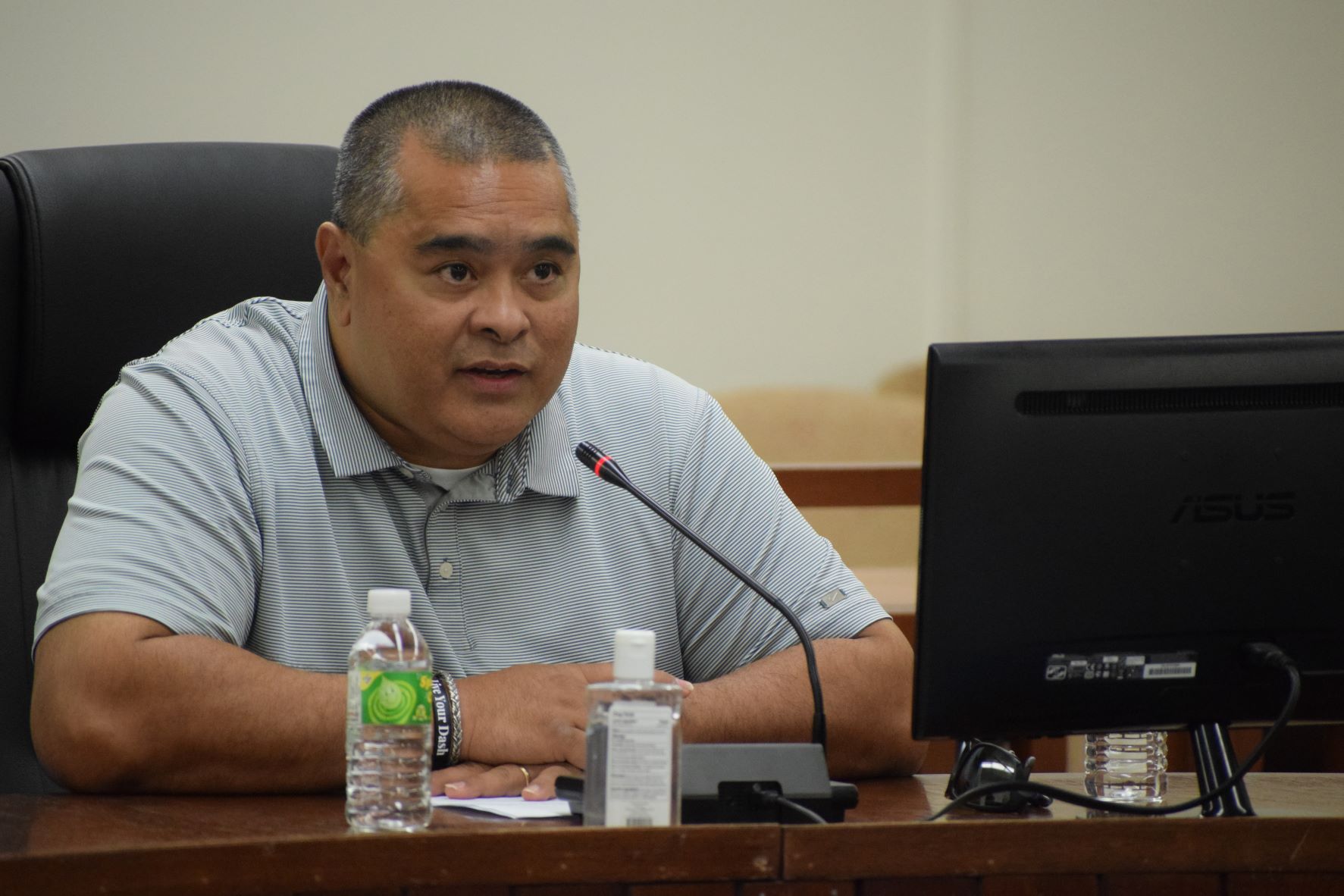 Former Finance Secretary David DLG Atalig speaks to members of a House joint committee in the House chamber on Thursday.