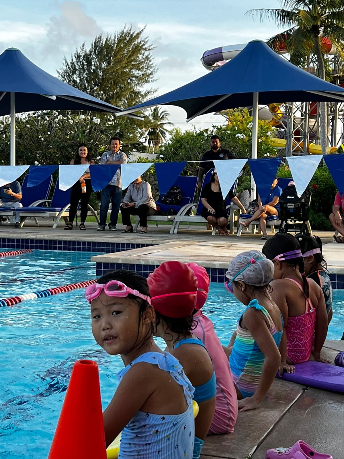 Saipan Swim Club swimmers wait for their turn to set new personal bests in the lap pool of PIC.