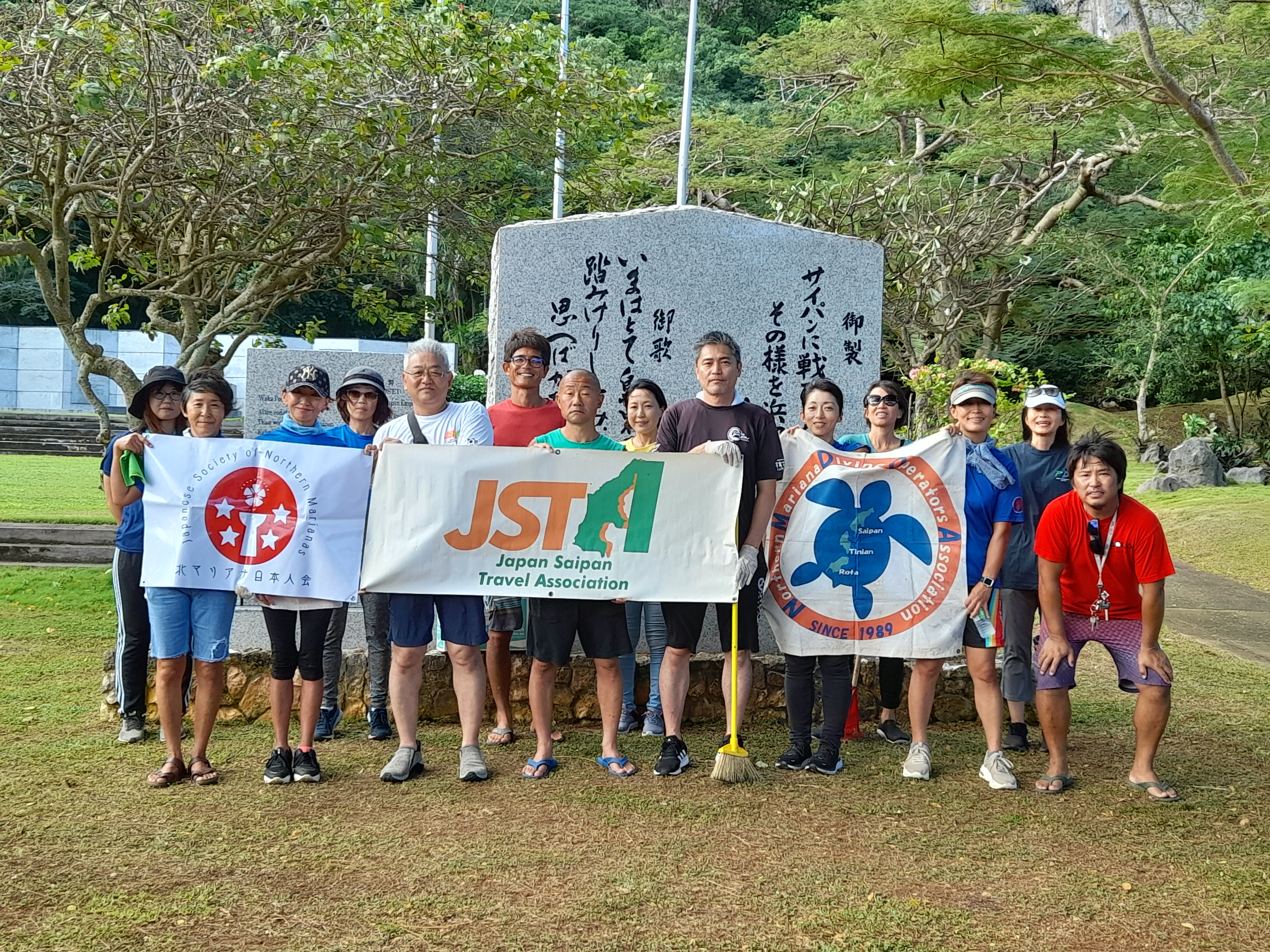 Representatives of 12 local businesses and offices join the Japan Saipan Travel Association and the Japanese Society of the Northern Marianas in their annual cleanup in the Marianas on Dec. 17, 2022, held this year at the Japanese Peace Memorial and Okinawan Peace Memorial in Marpi, Saipan.
