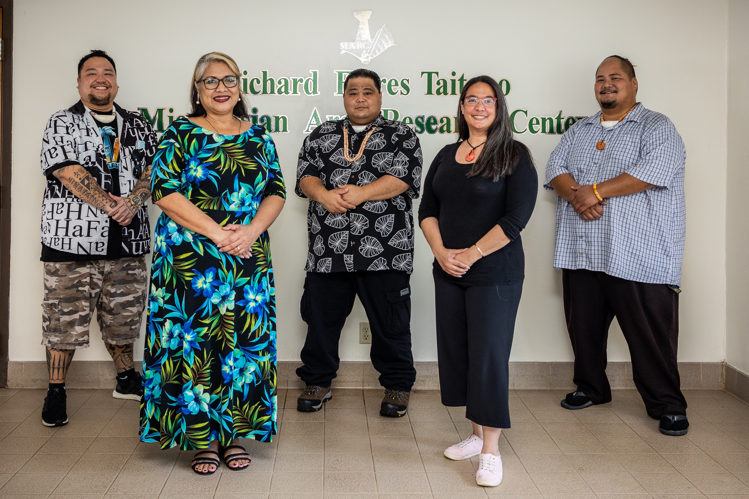 From left, Kenneth Gofigan Kuper, Assistant Professor of Political Science, CHamoru Studies, and Micronesian Studies; Lavonne Meno, Micronesian Area Research Center Administrative Officer; MARC Research Associate Daniel Pangelinan; Monique Carriveau Storie, Dean of University Libraries; and MARC Research Associate Jeremy Cepeda recently gather at MARC following the $1.13 million grant award. 