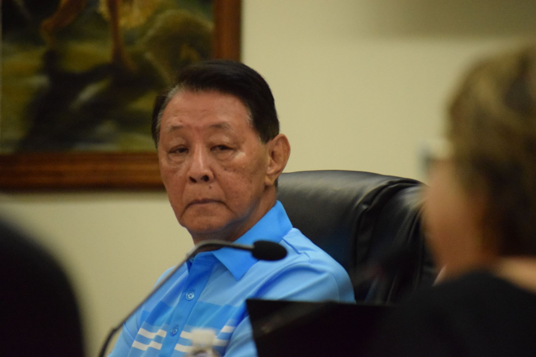 Marianas Visitors Authority board member Thomas Liu listens during a meeting with senators in the Senate chamber on Wednesday last week.